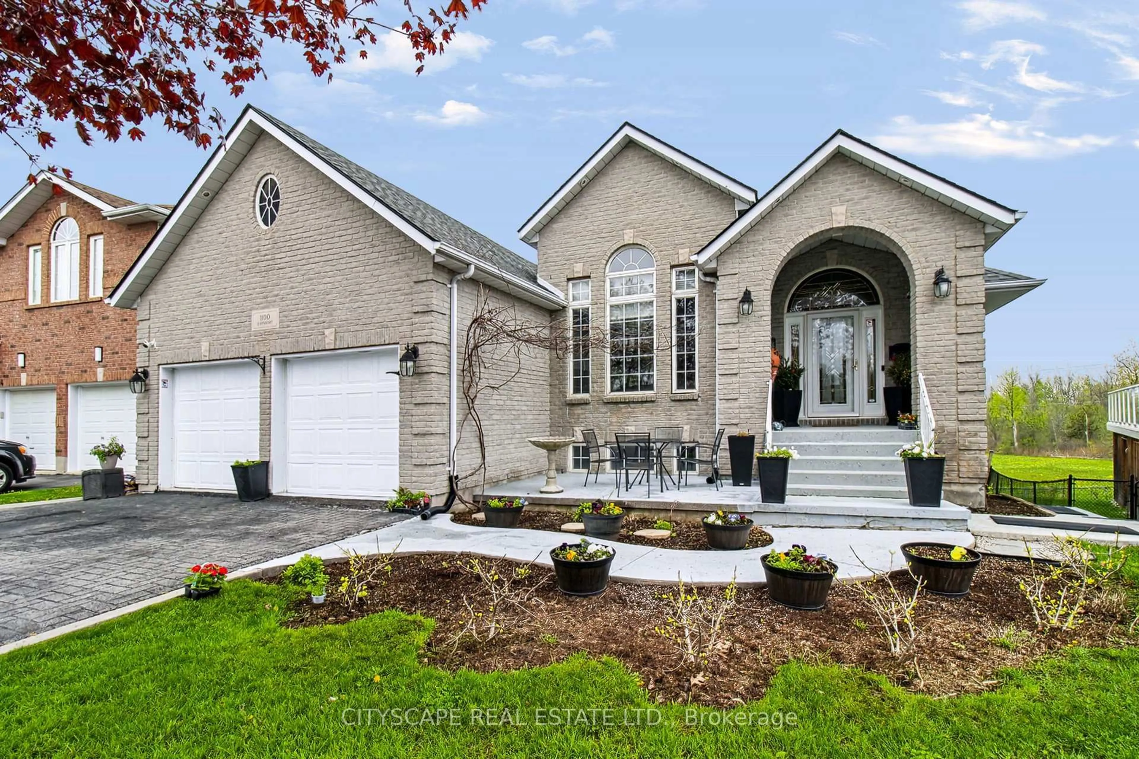 Home with vinyl exterior material, street for 1100 Earnhart St, Kingston Ontario K7P 3C2