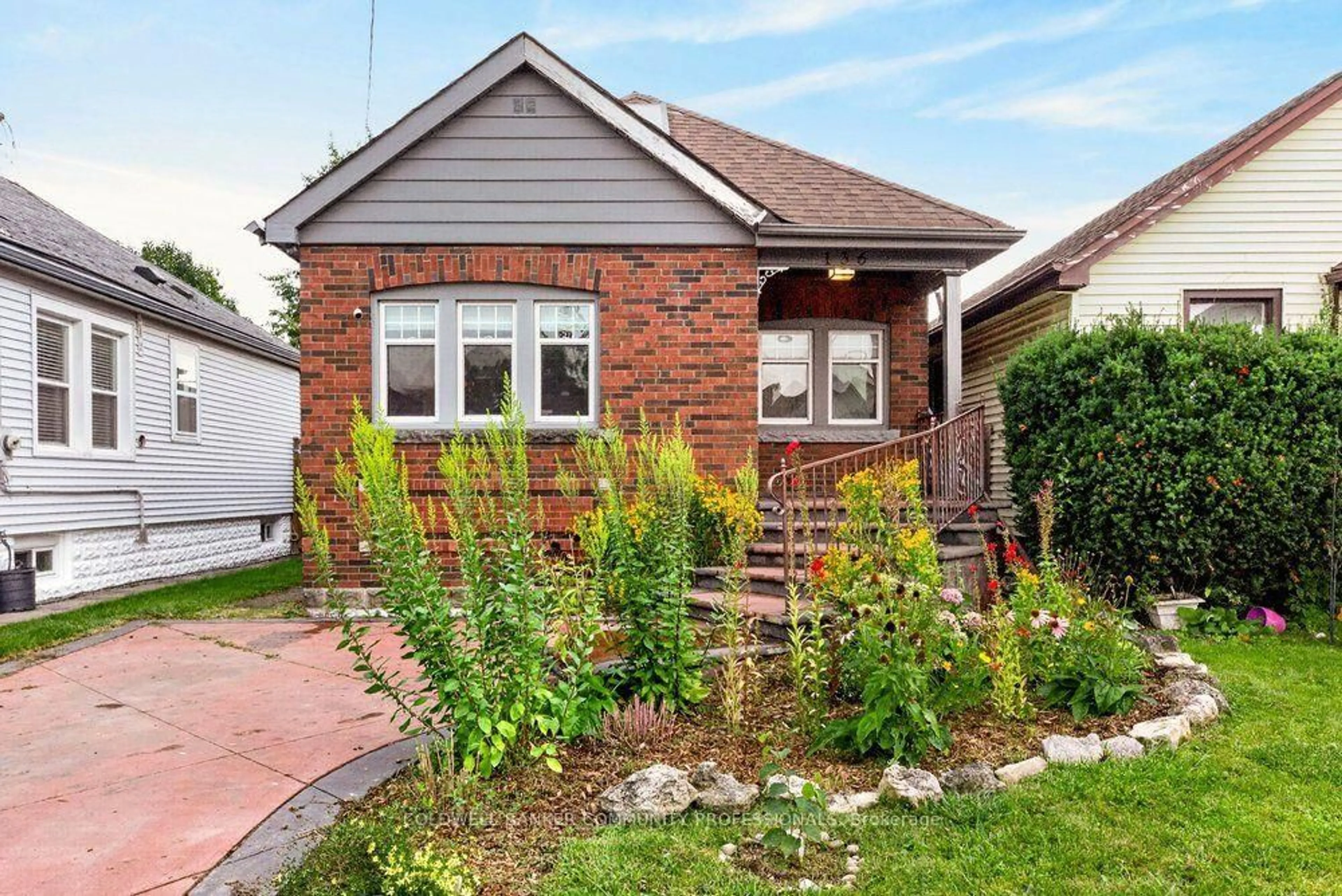 Home with brick exterior material, street for 136 Weir St, Hamilton Ontario L8H 5E9
