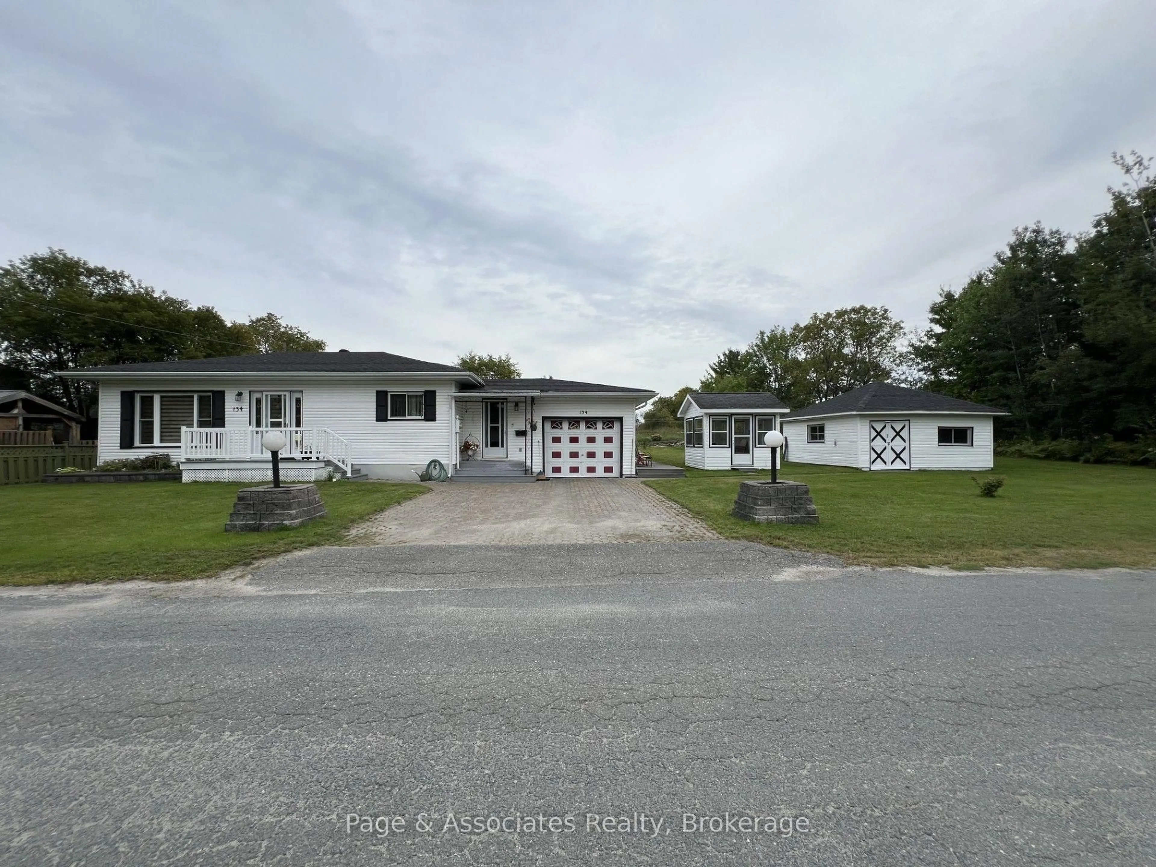 A pic from outside/outdoor area/front of a property/back of a property/a pic from drone, street for 134 Dufferin St, West Nipissing Ontario P2B 3H2