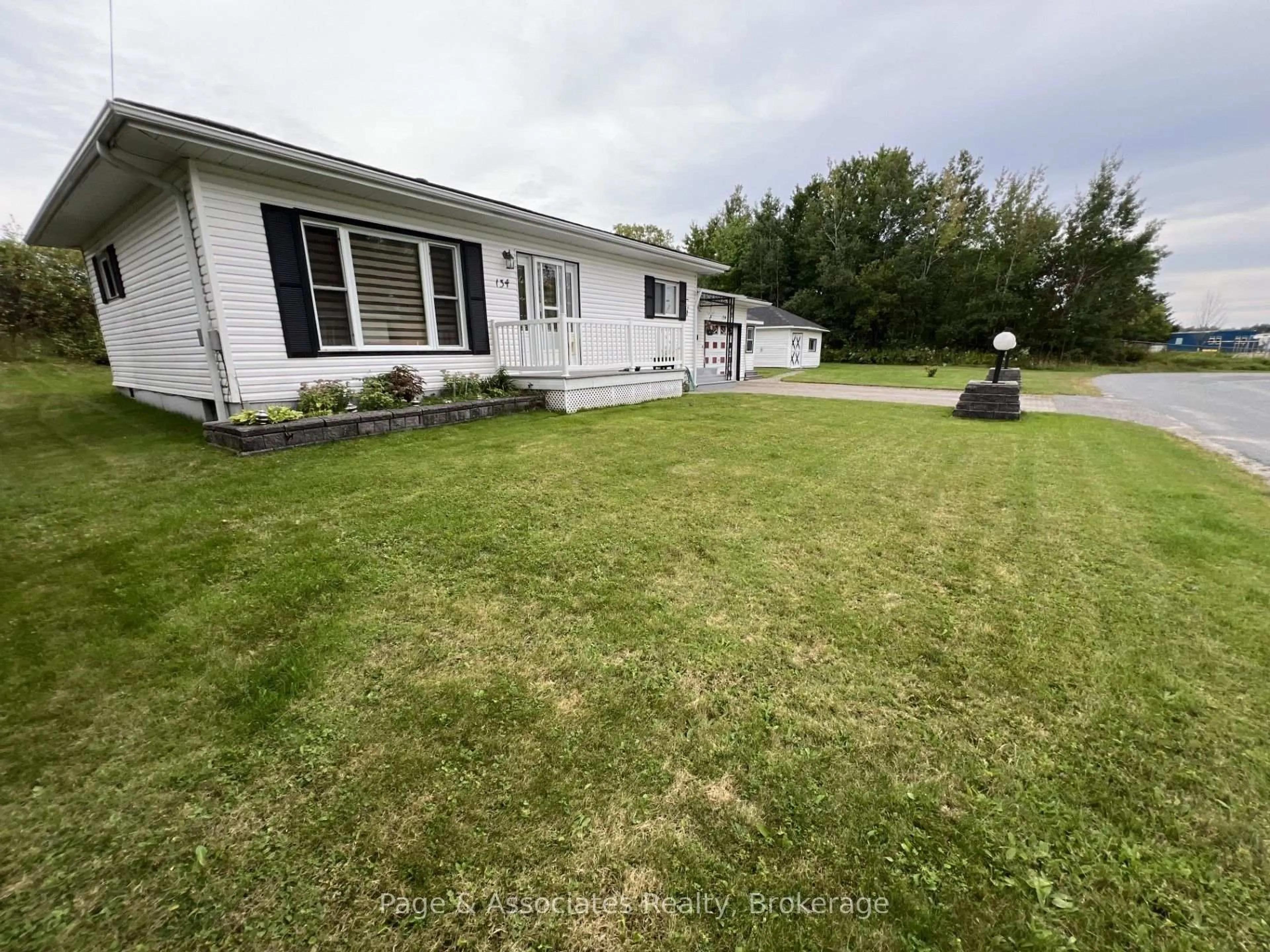 A pic from outside/outdoor area/front of a property/back of a property/a pic from drone, unknown for 134 Dufferin St, West Nipissing Ontario P2B 3H2