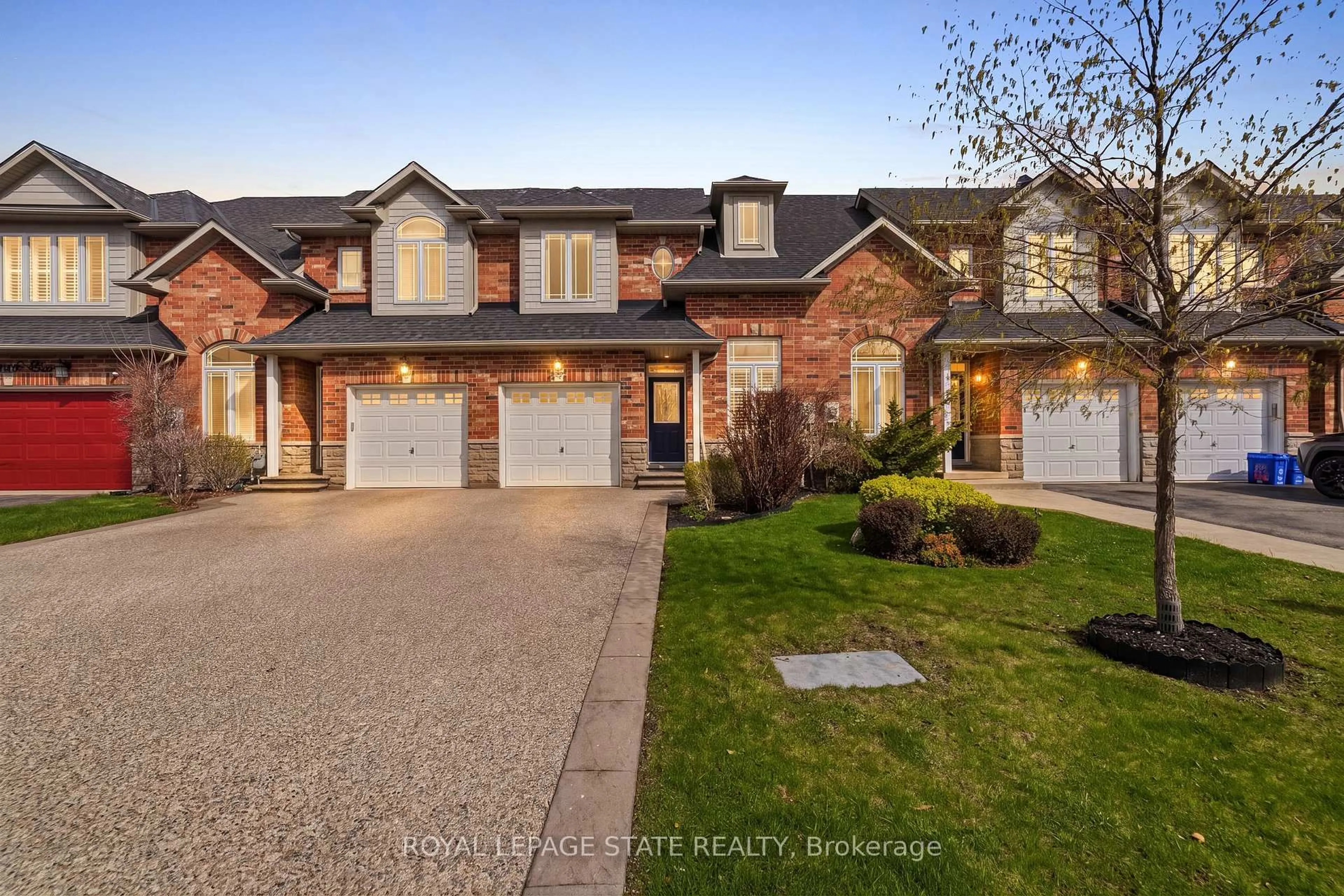 Home with brick exterior material, street for 92 Benziger Lane, Hamilton Ontario L8E 6G5