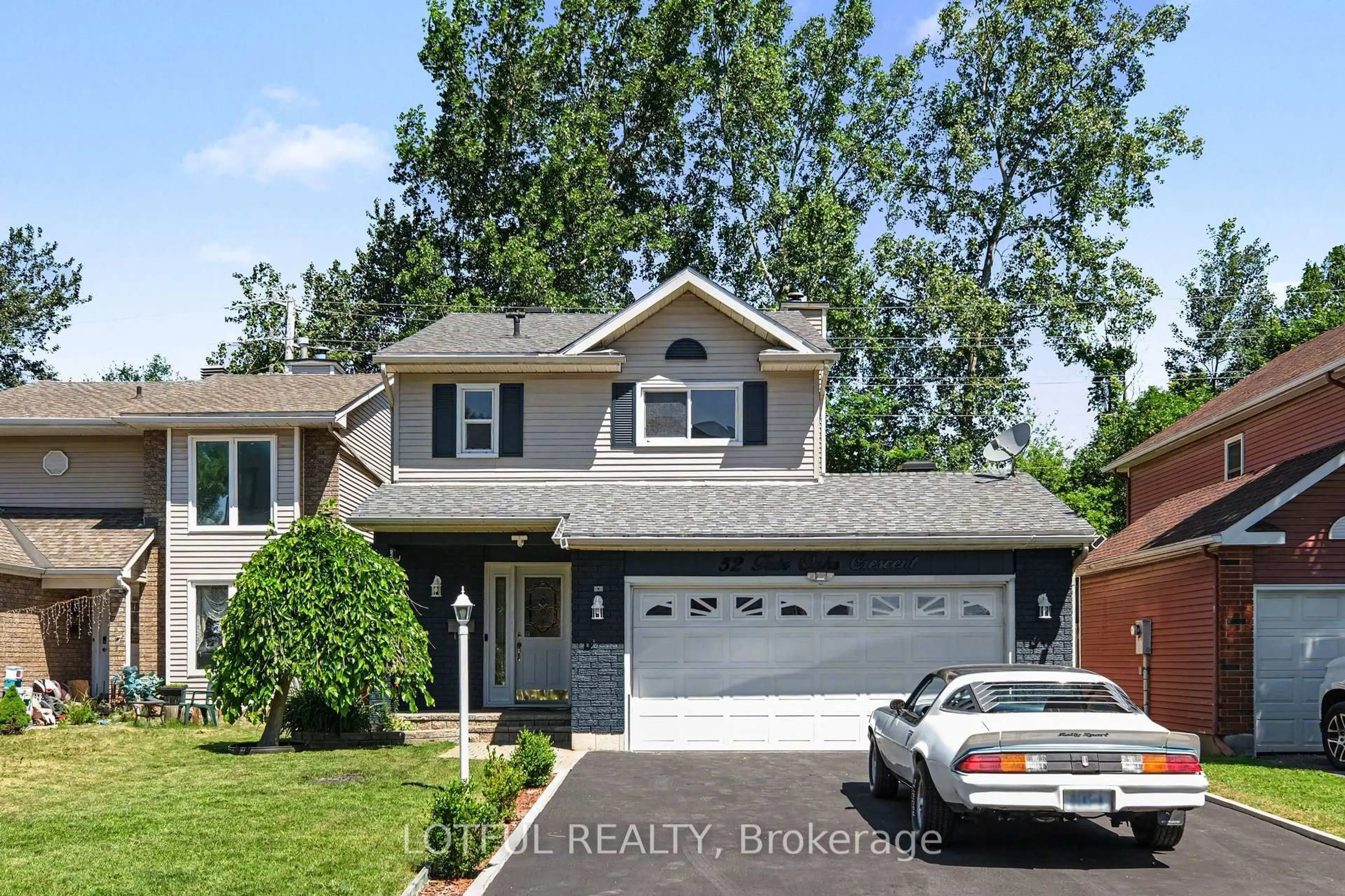 Home with vinyl exterior material, street for 52 Fair Oaks Cres, Ottawa Ontario K2G 4W5