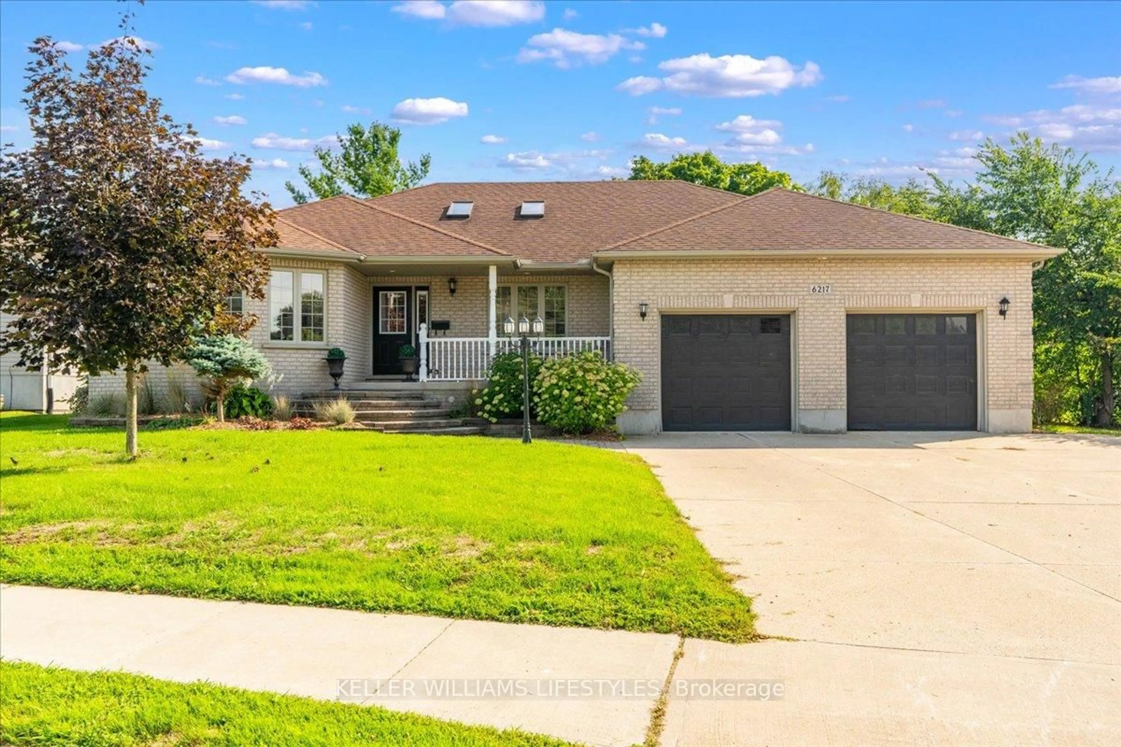 Home with vinyl exterior material, street for 6217 Townsend Line, Lambton Shores Ontario N0N 1J0