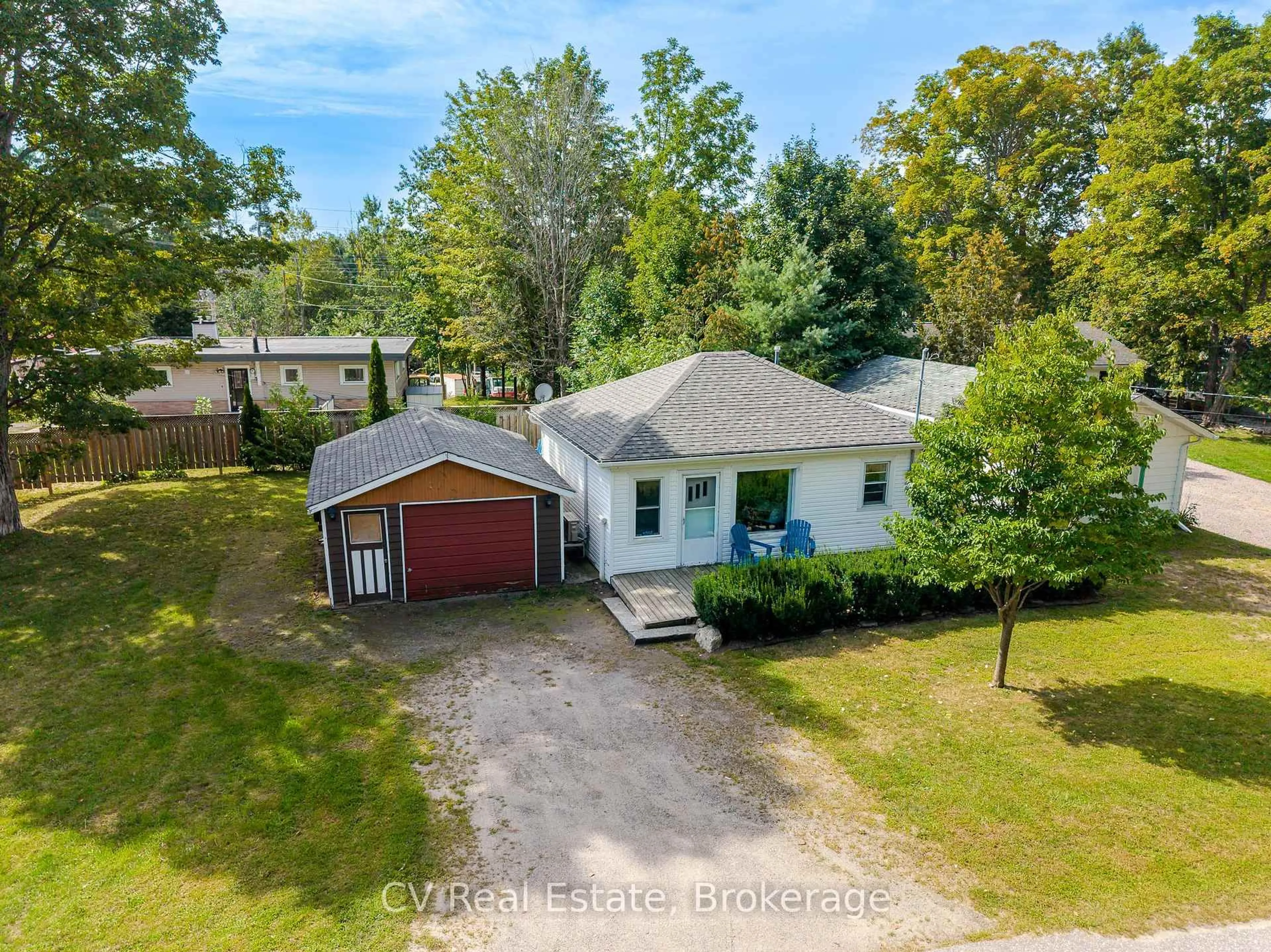 A pic from outside/outdoor area/front of a property/back of a property/a pic from drone, street for 1016 Mill St, Muskoka Lakes Ontario P0C 1A0
