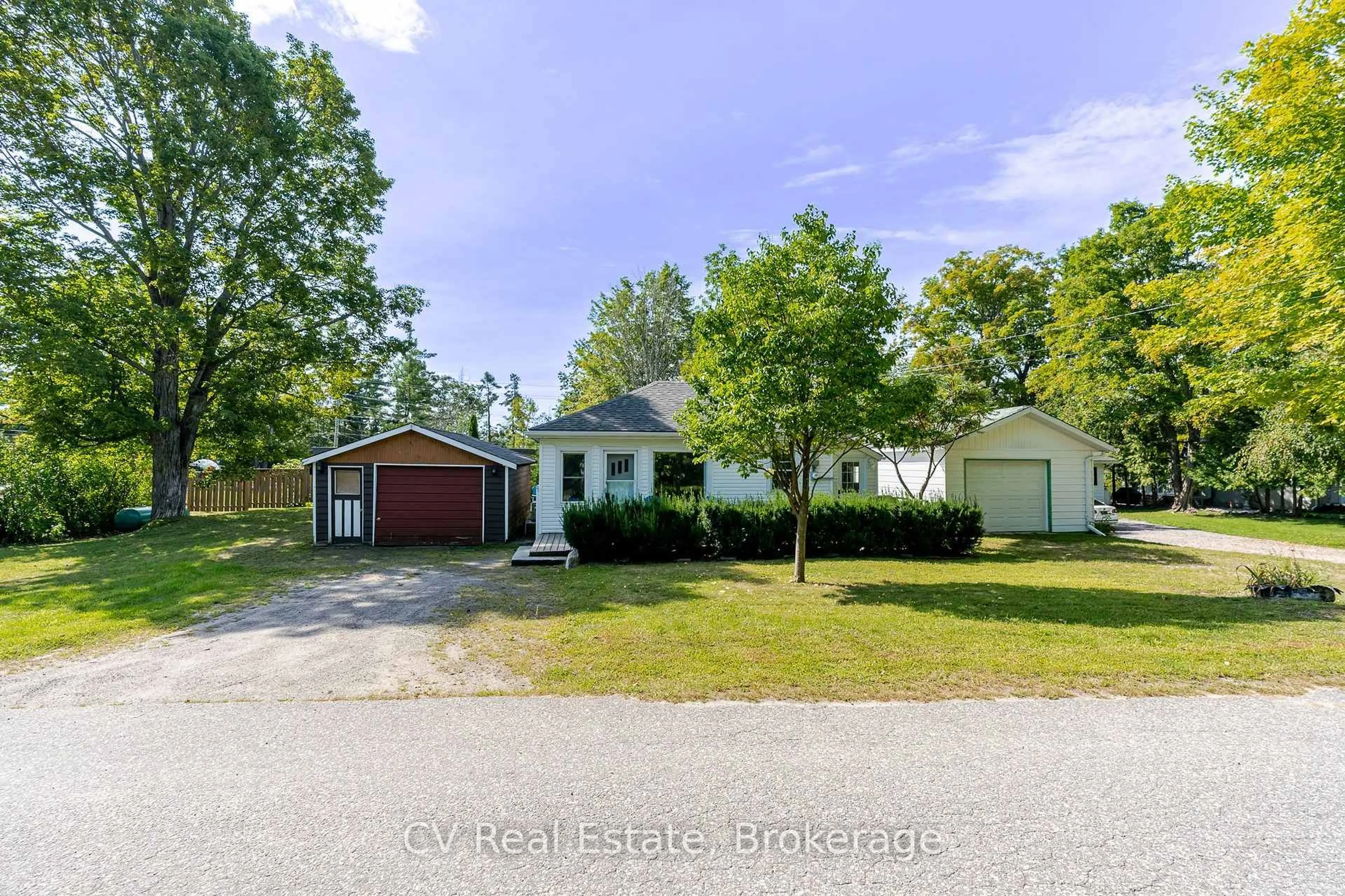 A pic from outside/outdoor area/front of a property/back of a property/a pic from drone, street for 1016 Mill St, Muskoka Lakes Ontario P0C 1A0