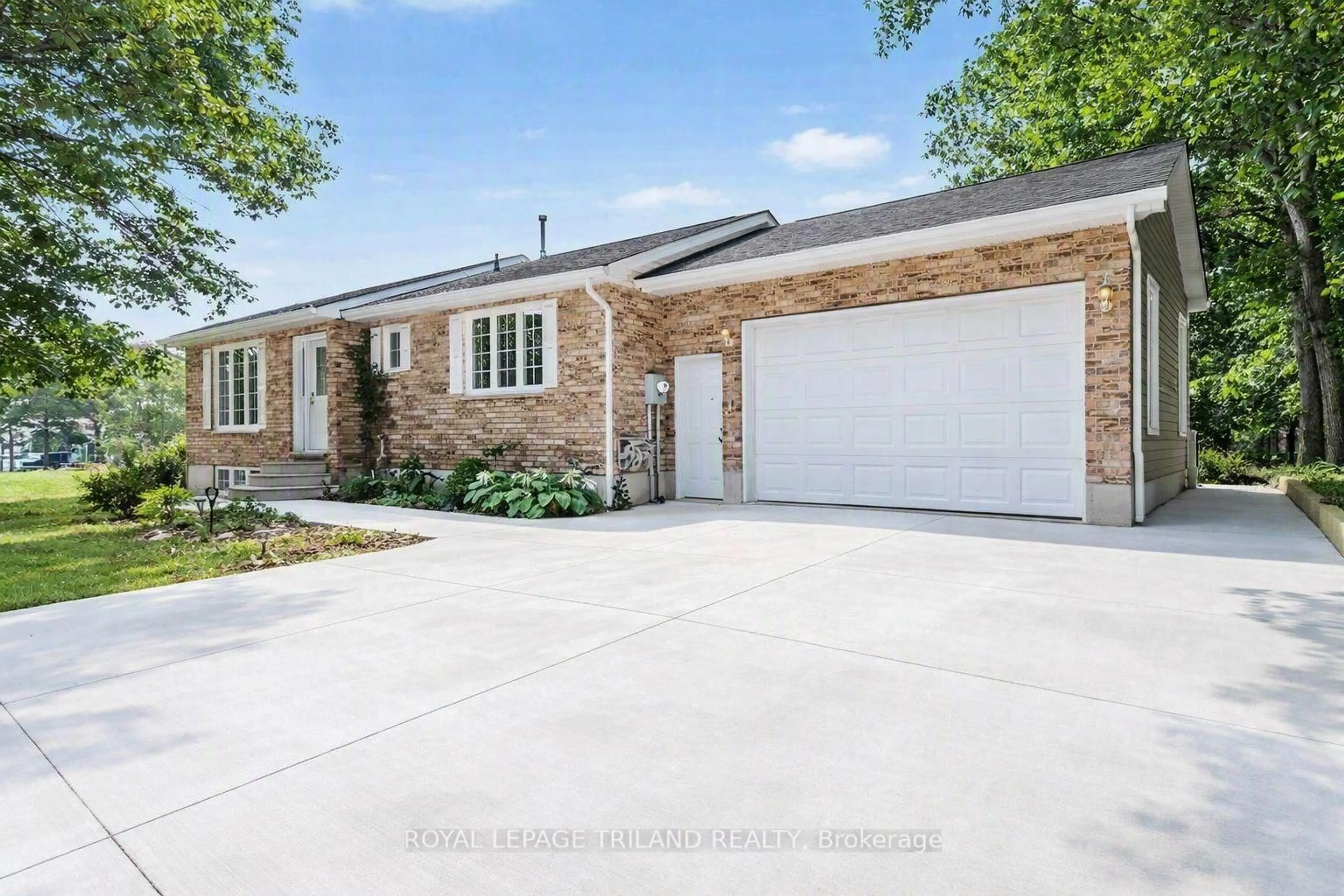 Home with brick exterior material, street for 10234 Julie Ave, Lambton Shores Ontario N0M 1T0