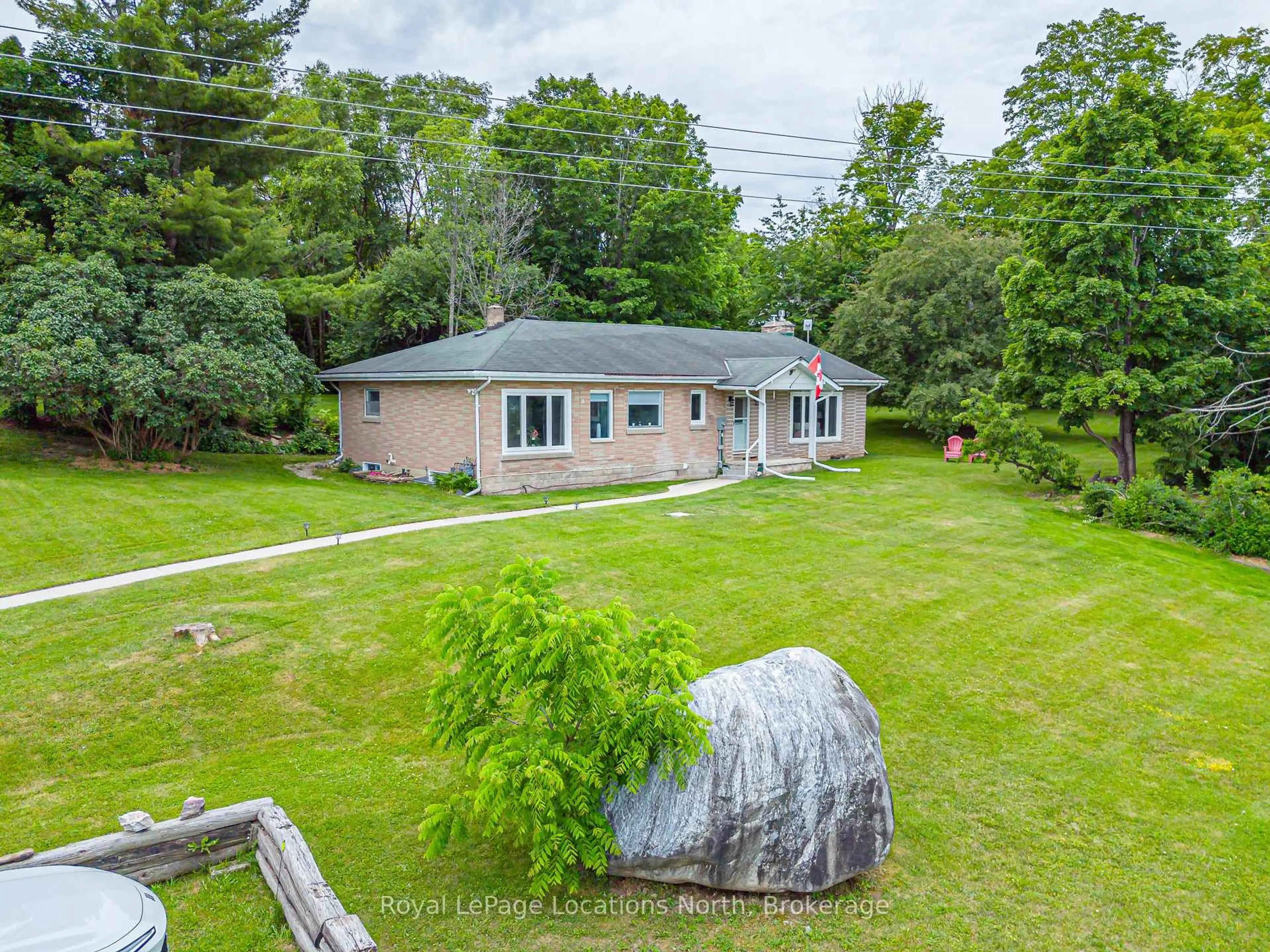 A pic from outside/outdoor area/front of a property/back of a property/a pic from drone, unknown for 206720 Highway 26, Meaford Ontario N4L 1W7
