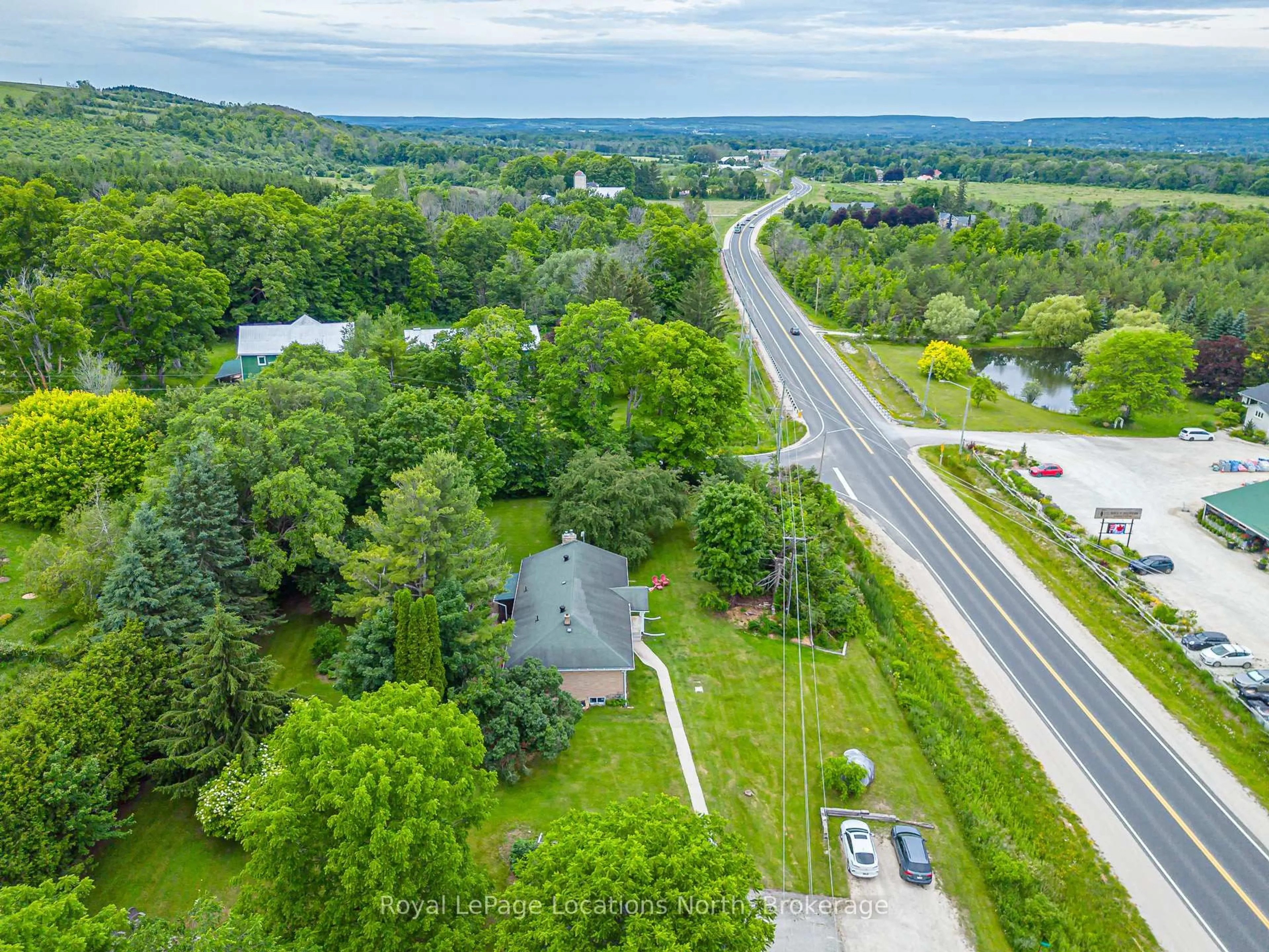 A pic from outside/outdoor area/front of a property/back of a property/a pic from drone, unknown for 206720 Highway 26, Meaford Ontario N4L 1W7