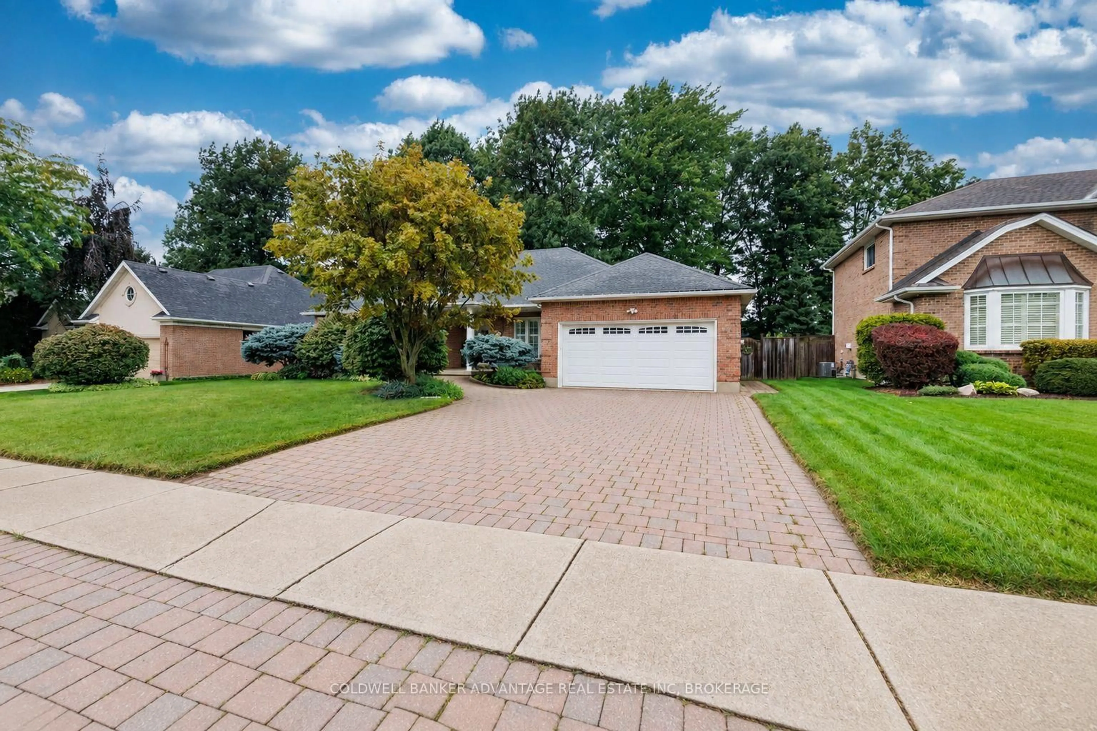 Home with brick exterior material, street for 8165 Mount Olive Cres, Niagara Falls Ontario L2H 2Y9
