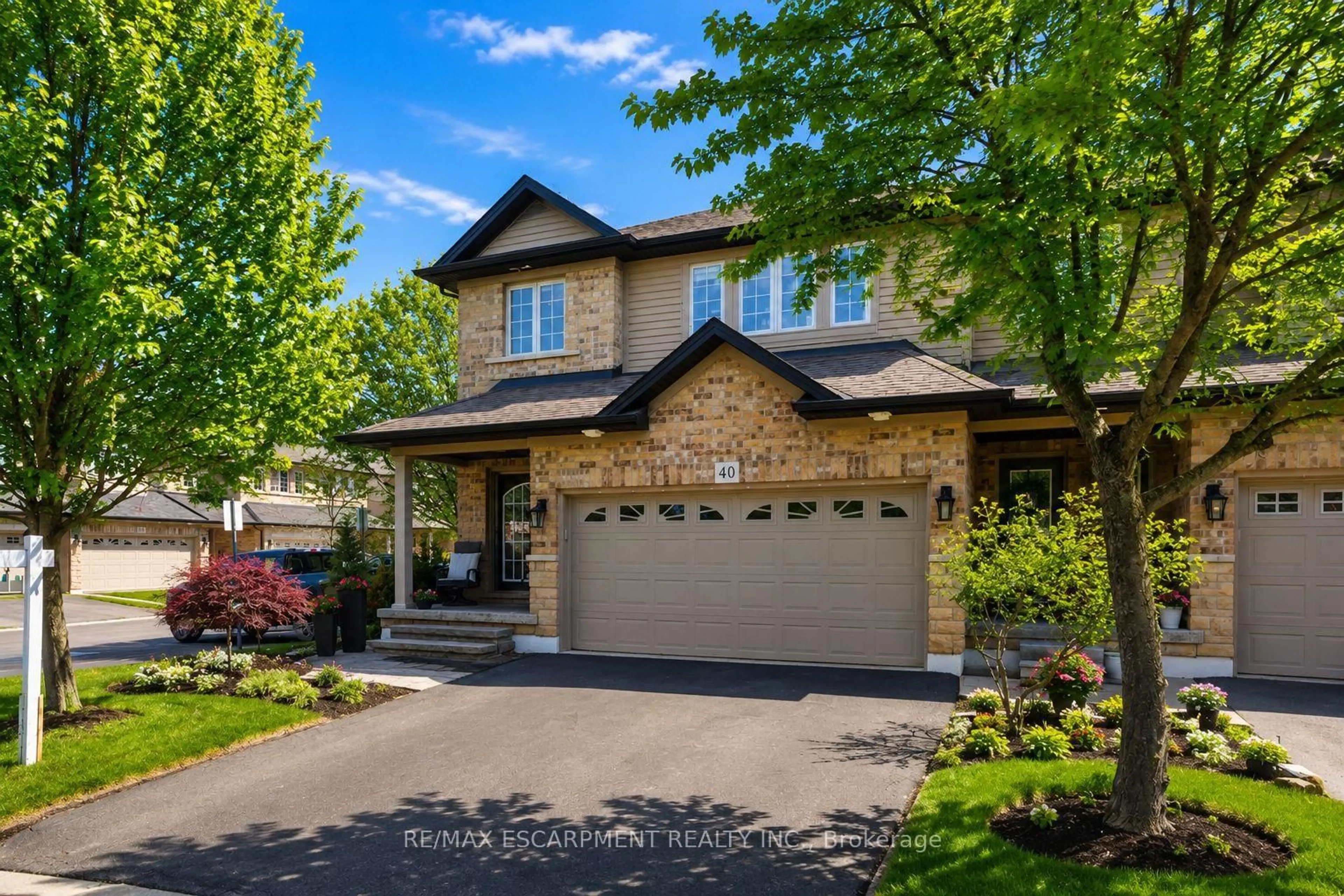Home with brick exterior material, street for 441 STONEHENGE Dr #40, Hamilton Ontario L9K 0B1