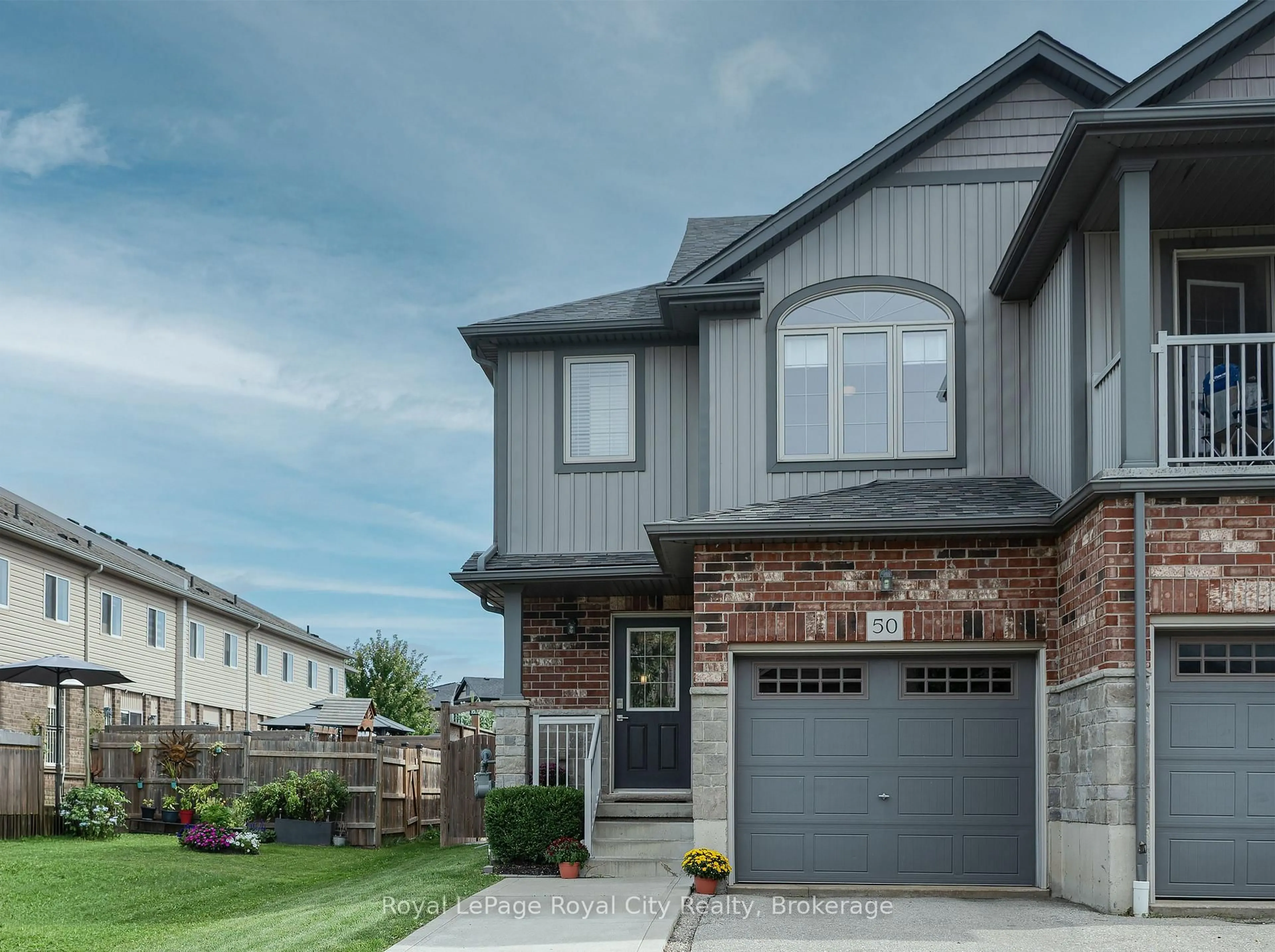 Home with brick exterior material, street for 50 Machado St, Kitchener Ontario N2R 0C2