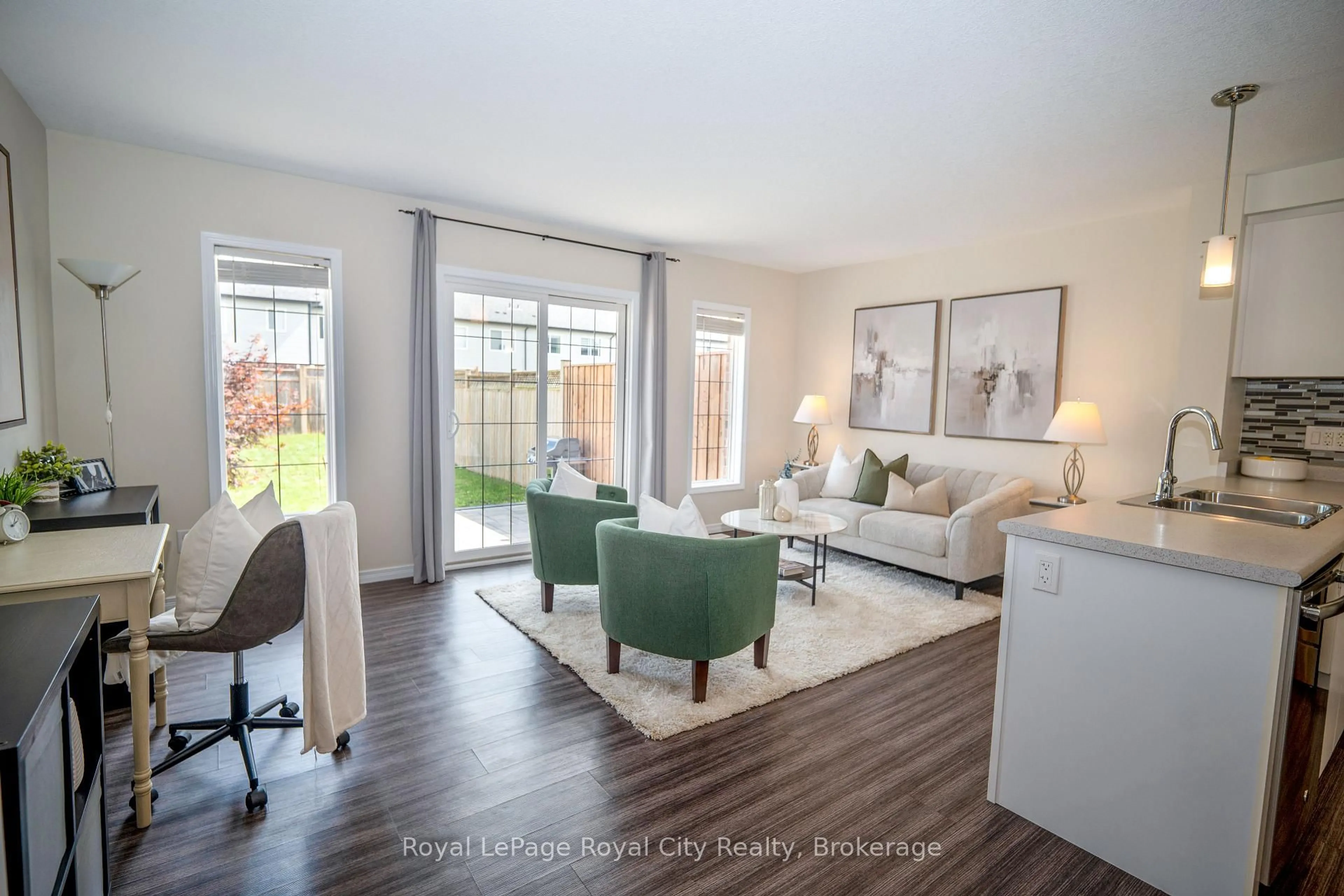 Living room with furniture, wood/laminate floor for 50 Machado St, Kitchener Ontario N2R 0C2