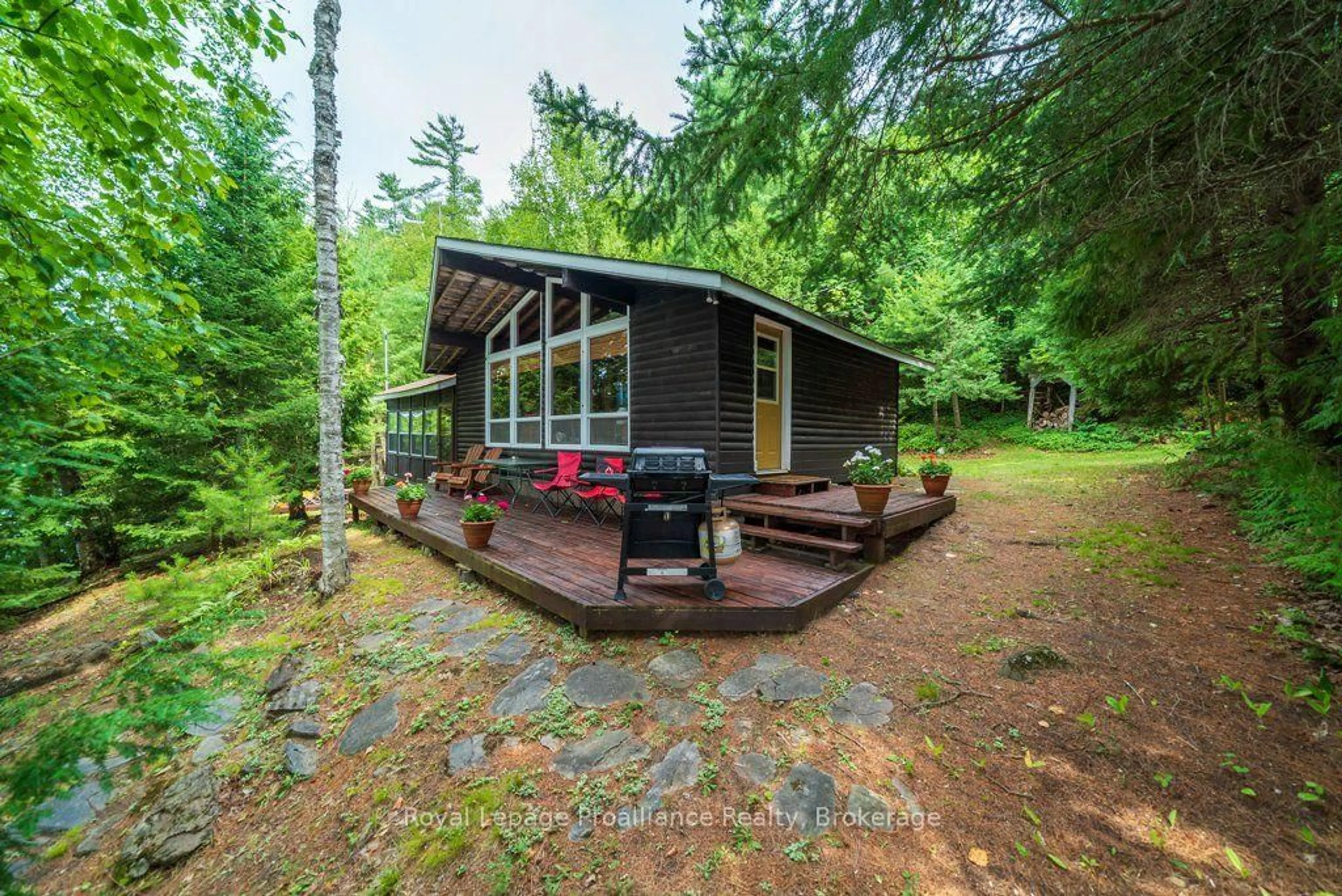 Patio, forest/trees view for 1021 Blue Jay Lane, Arden Ontario K0H 1B0