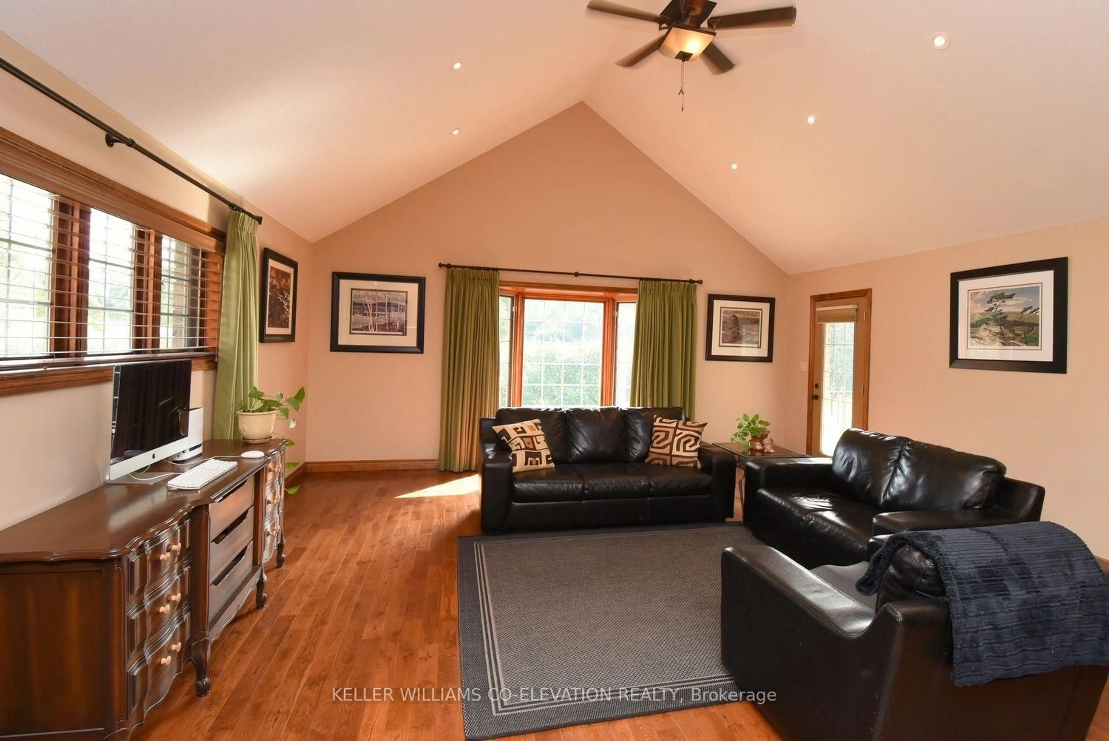 Living room with furniture, wood/laminate floor for 635 Millgrove Sdrd, Hamilton Ontario L8B 0W7