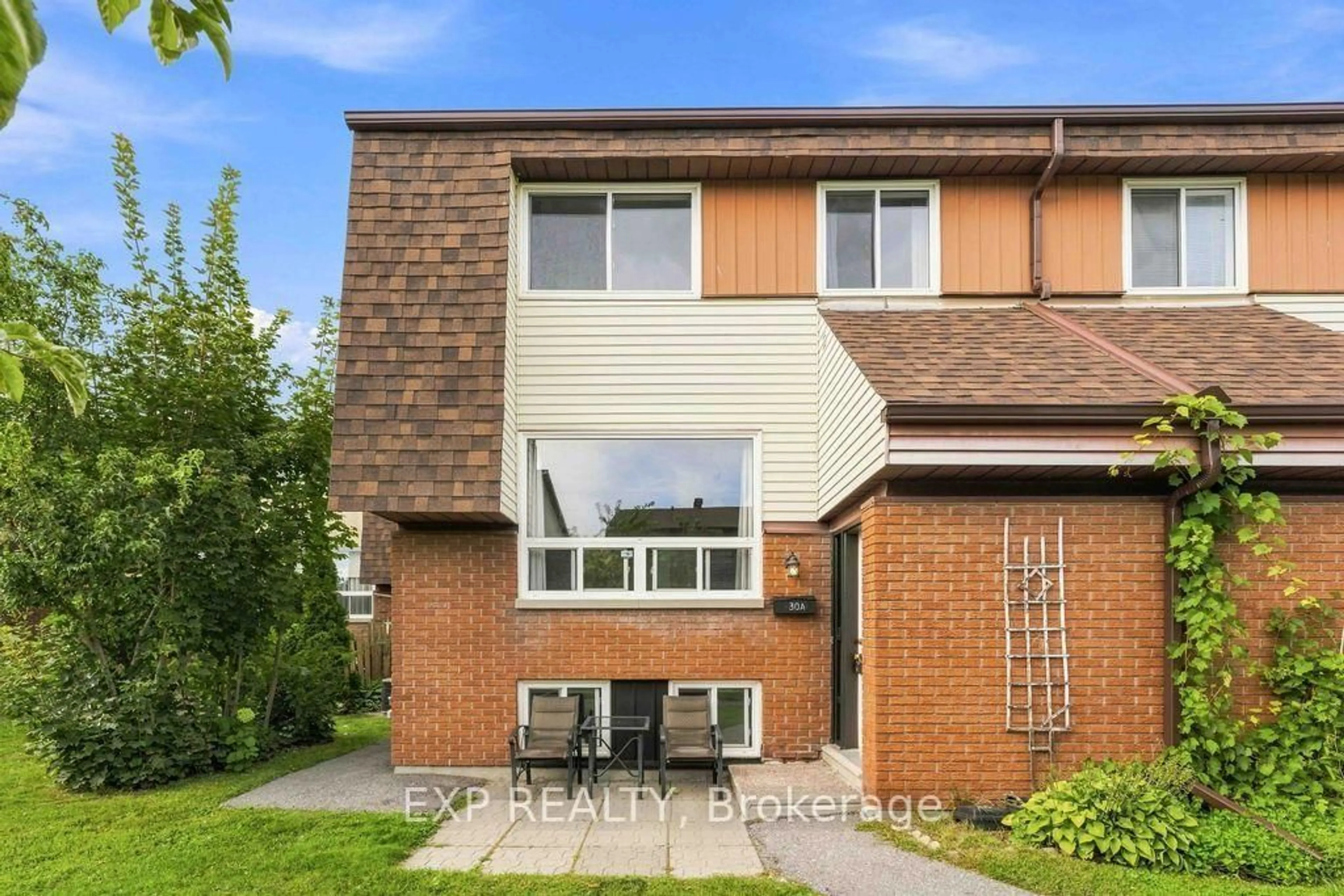 Home with brick exterior material, street for 30A WOODVALE Green #30A, Ottawa Ontario K2G 4H4