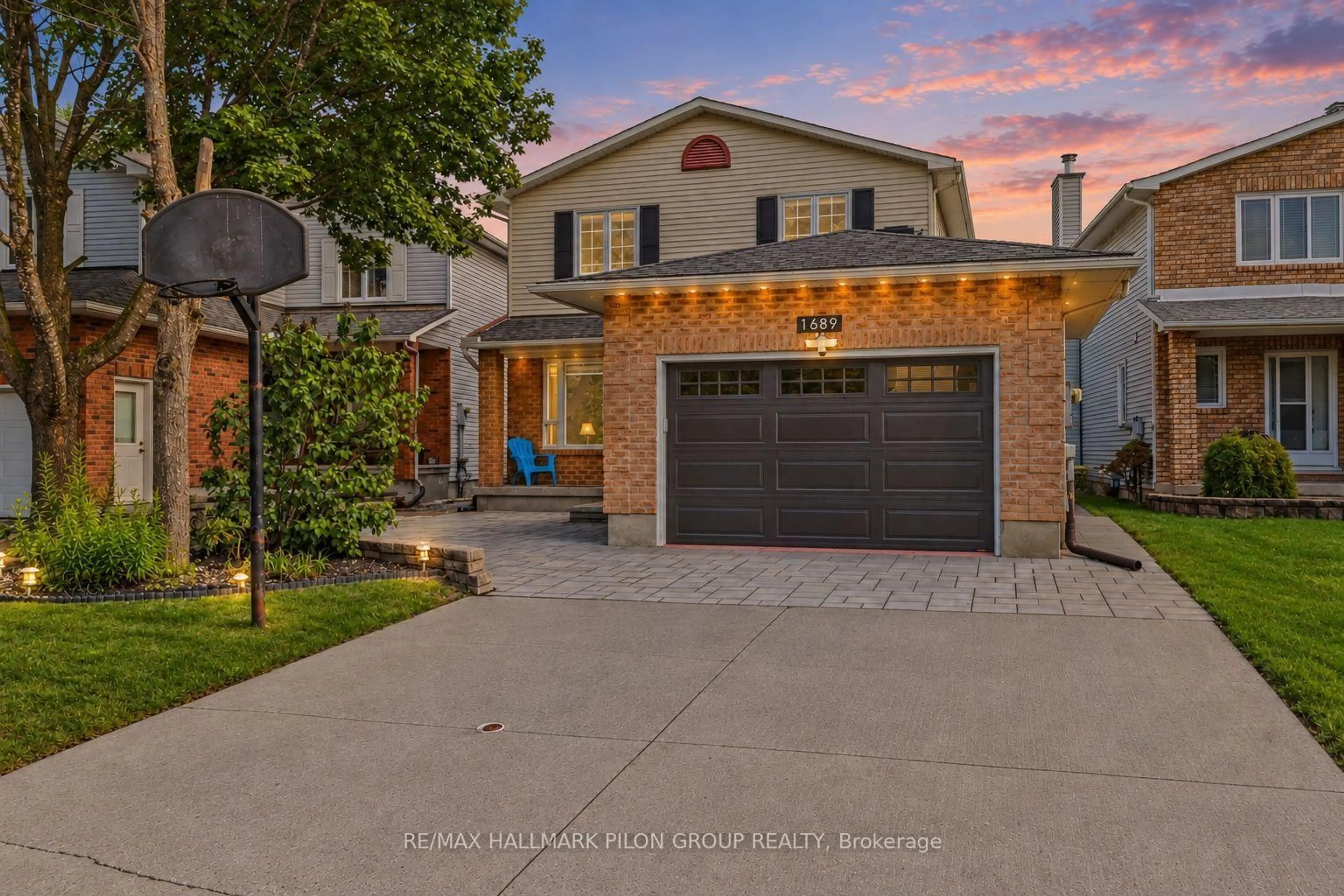 Home with brick exterior material, street for 1689 Champneuf Dr, Ottawa Ontario K1C 4V1