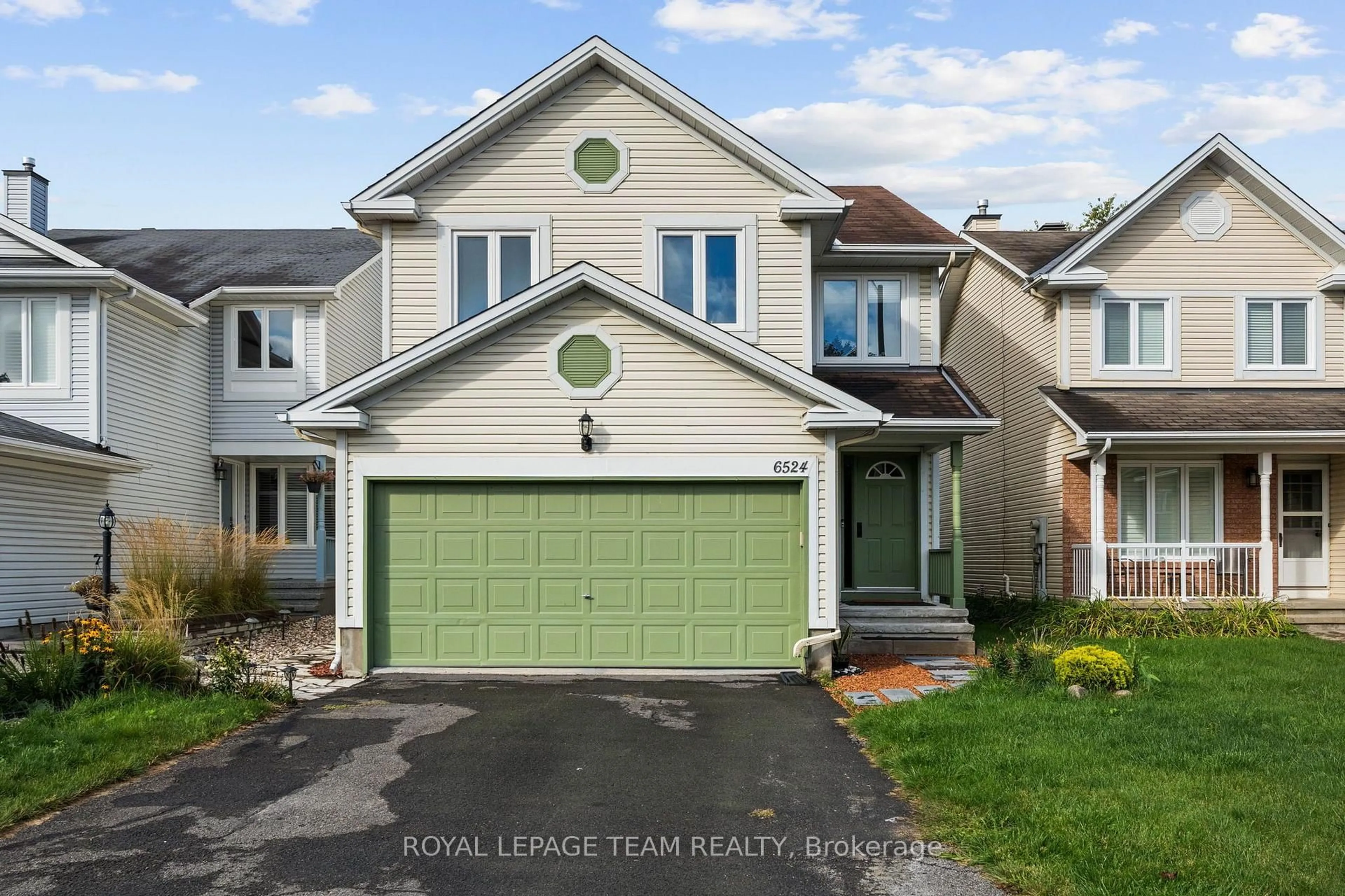 Home with vinyl exterior material, street for 6524 Tooney Dr, Orleans Ontario K1C 7H1