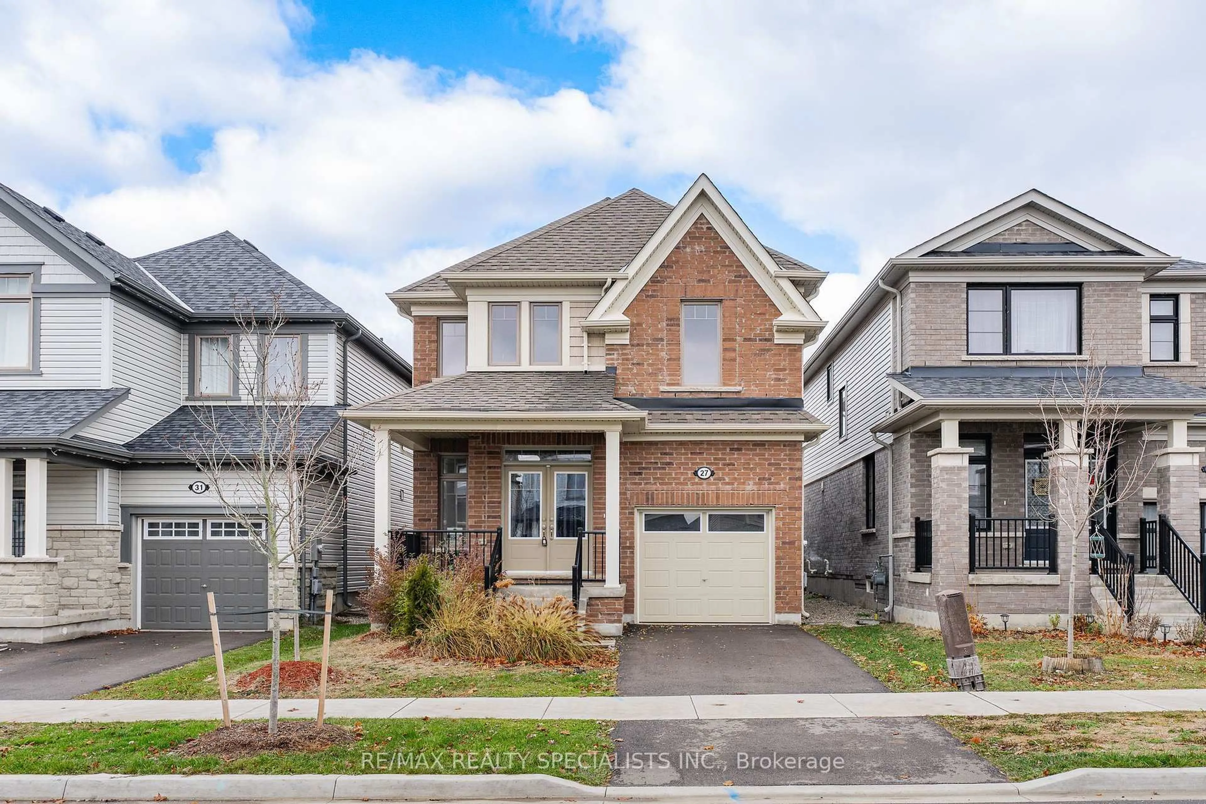 Home with brick exterior material, street for 27 Harpin Way, Centre Wellington Ontario N1M 0H8