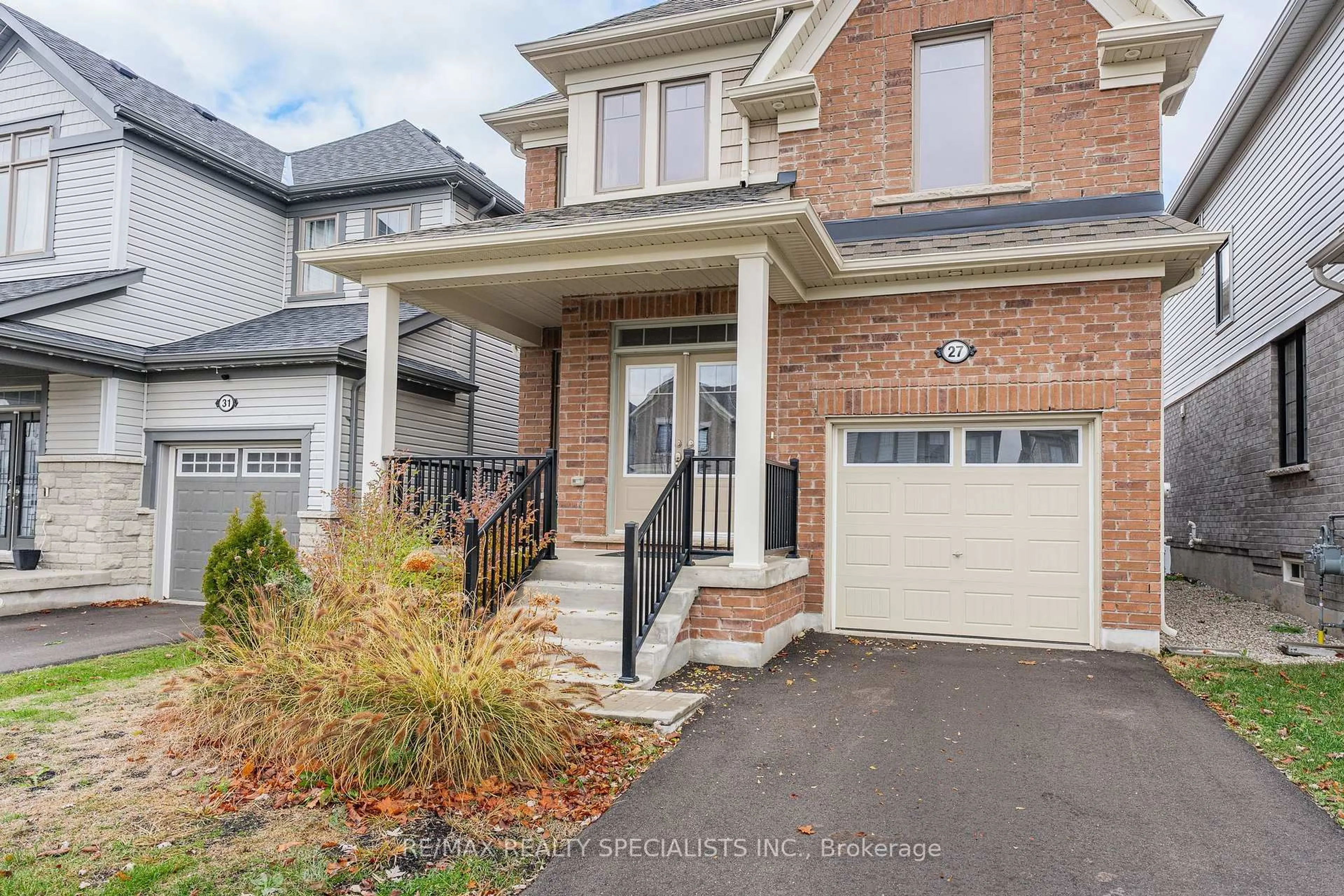 Home with brick exterior material, street for 27 Harpin Way, Centre Wellington Ontario N1M 0H8