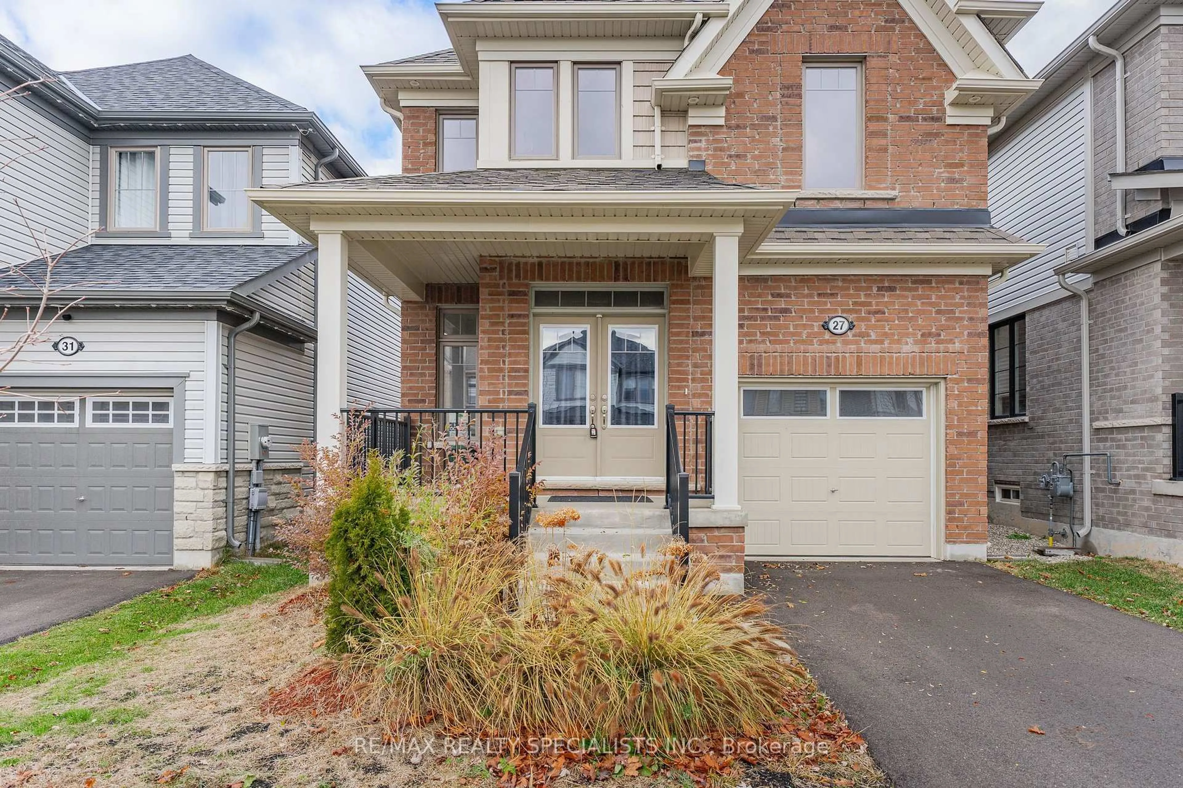 Home with brick exterior material, street for 27 Harpin Way, Centre Wellington Ontario N1M 0H8