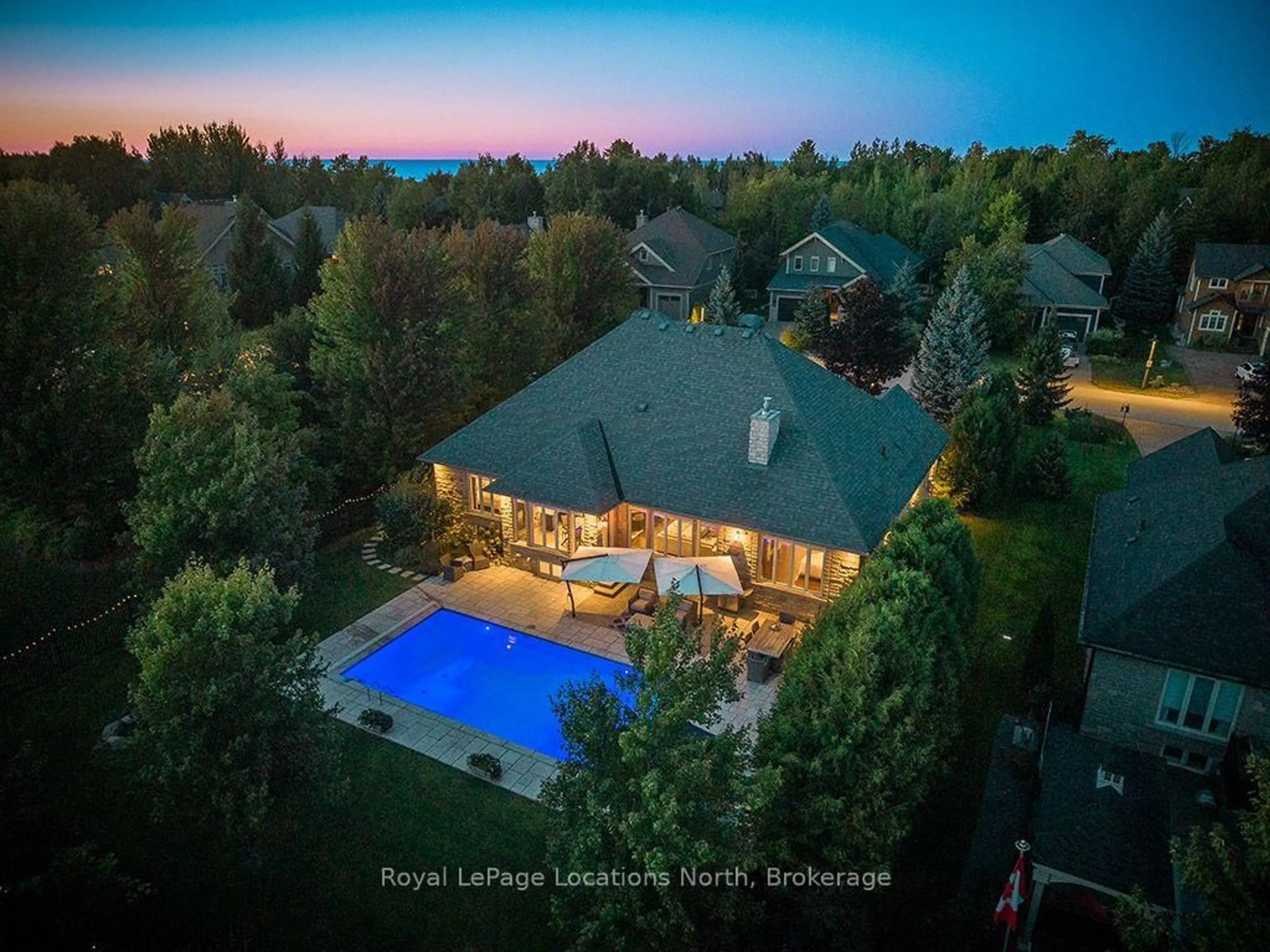 A pic from outside/outdoor area/front of a property/back of a property/a pic from drone, water/lake/river/ocean view for 150 Rankin's Cres, Blue Mountains Ontario N0H 2P0
