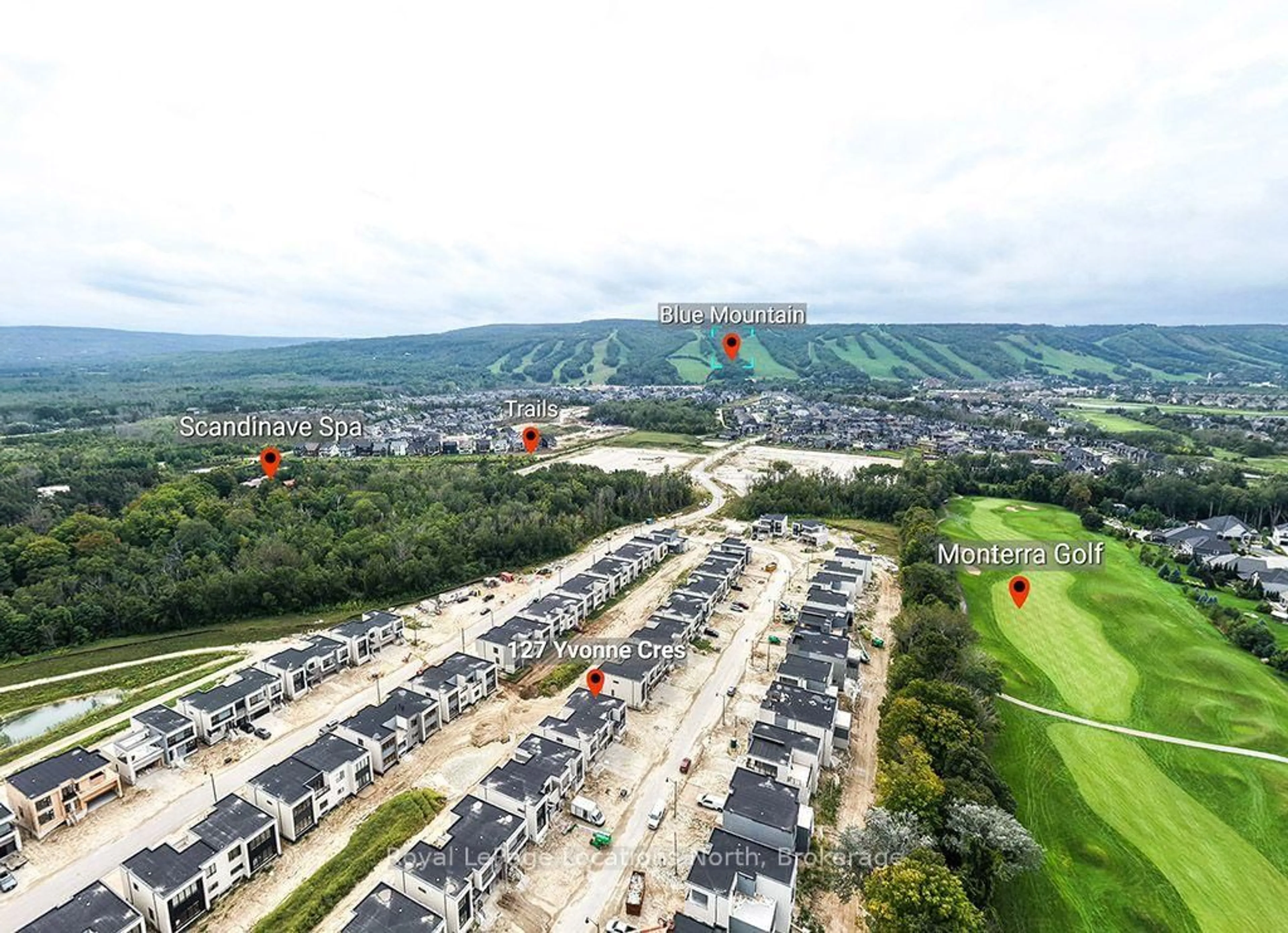 A pic from outside/outdoor area/front of a property/back of a property/a pic from drone, mountain view for 127 Yvonne Cres, Blue Mountains Ontario L9Y 5T9
