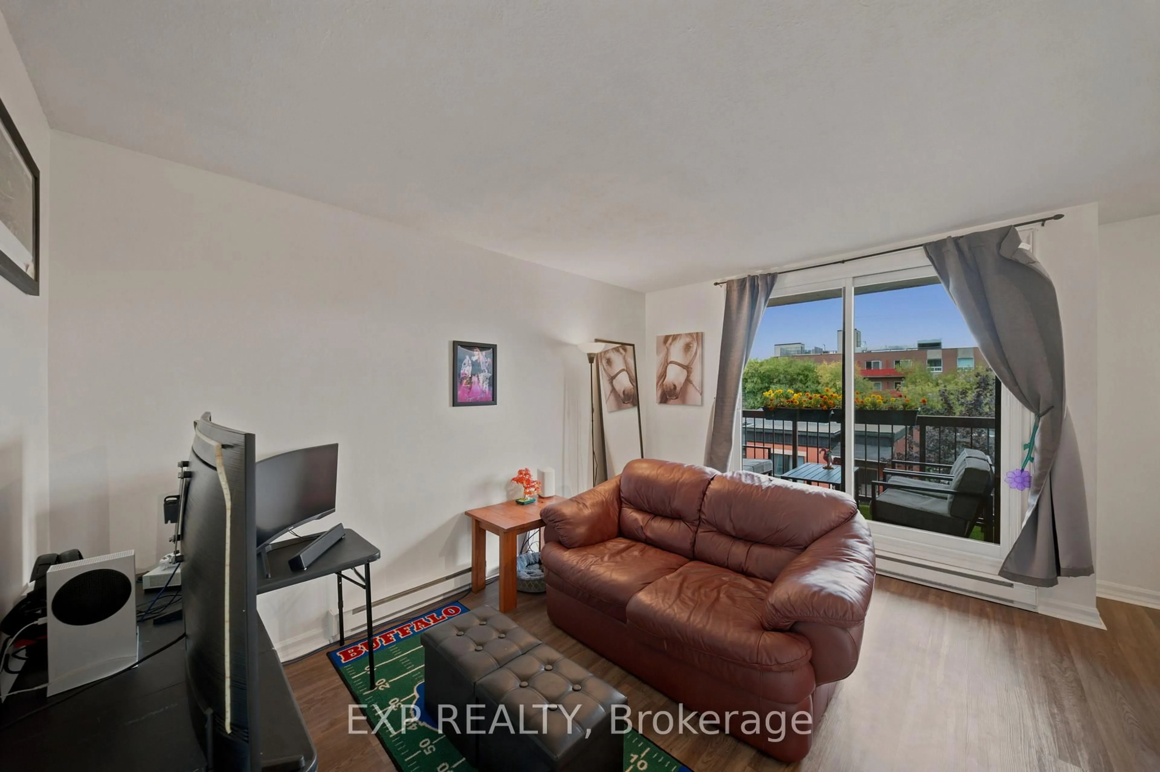 Living room with furniture, unknown for 222 Guigues Ave #401, Ottawa Ontario K1N 5J2