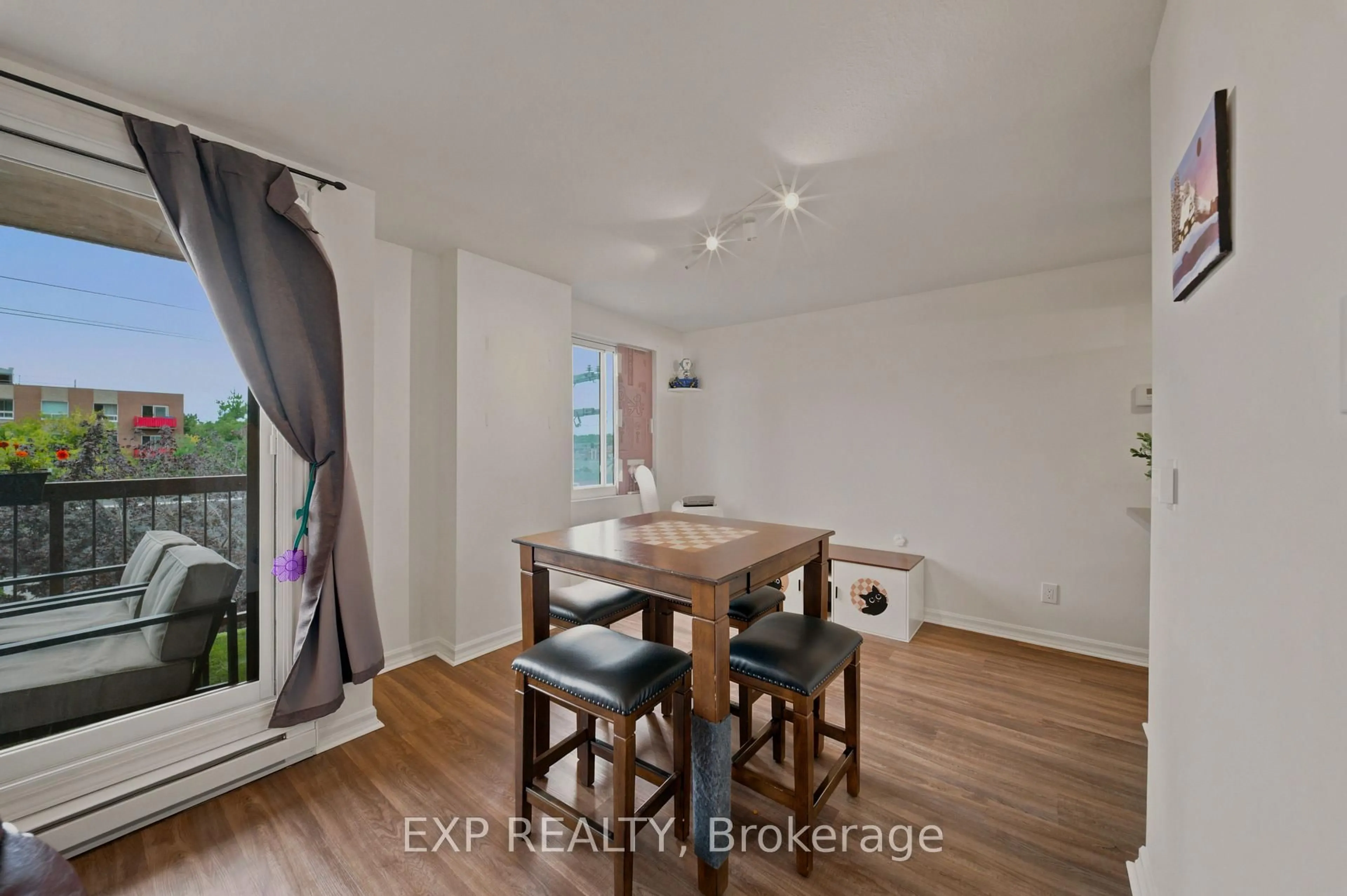Dining room, wood/laminate floor for 222 Guigues Ave #401, Ottawa Ontario K1N 5J2