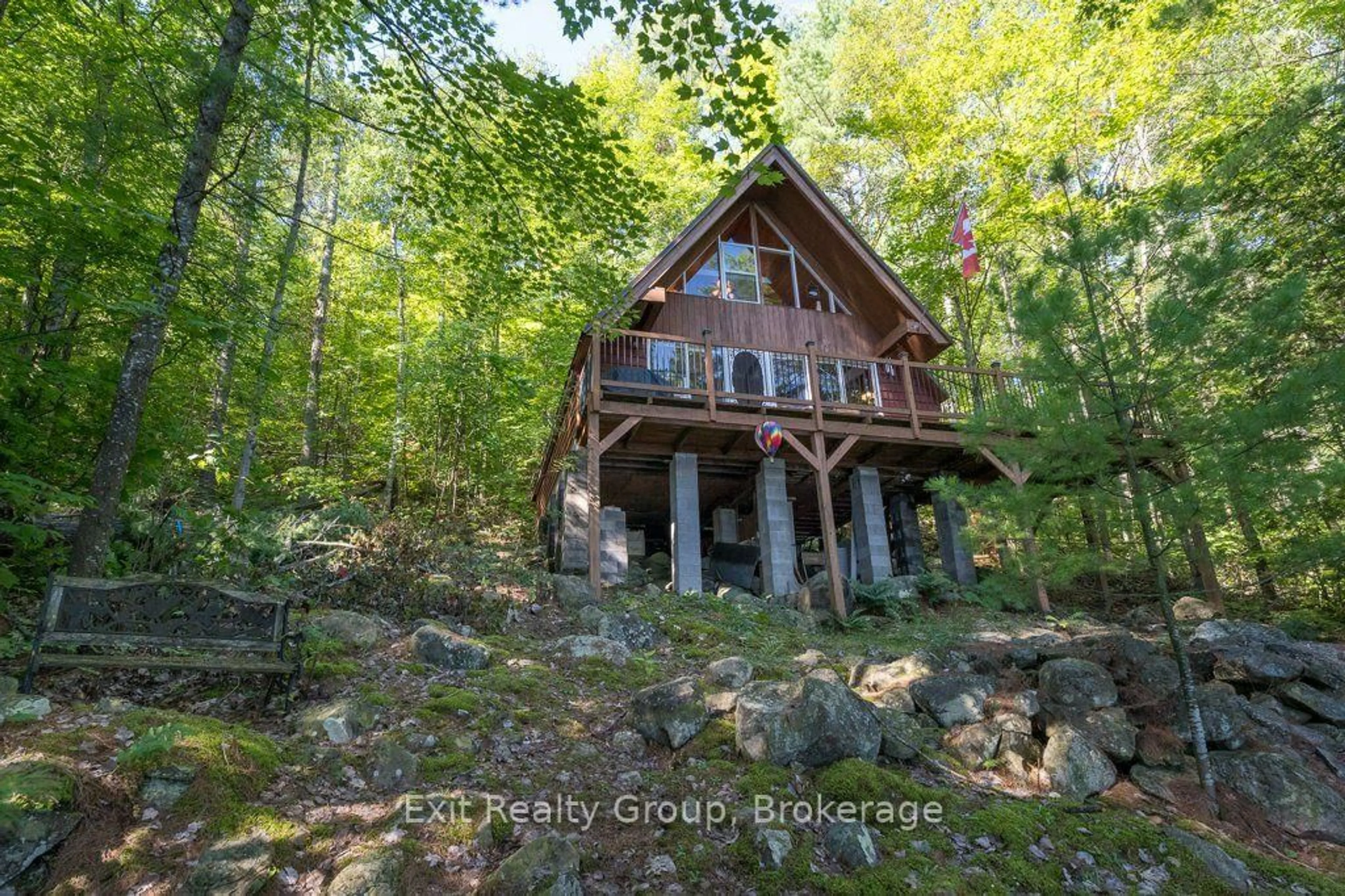 A pic from outside/outdoor area/front of a property/back of a property/a pic from drone, water/lake/river/ocean view for 2010 Shabomeka Lake, Cloyne Ontario K0H 1K0