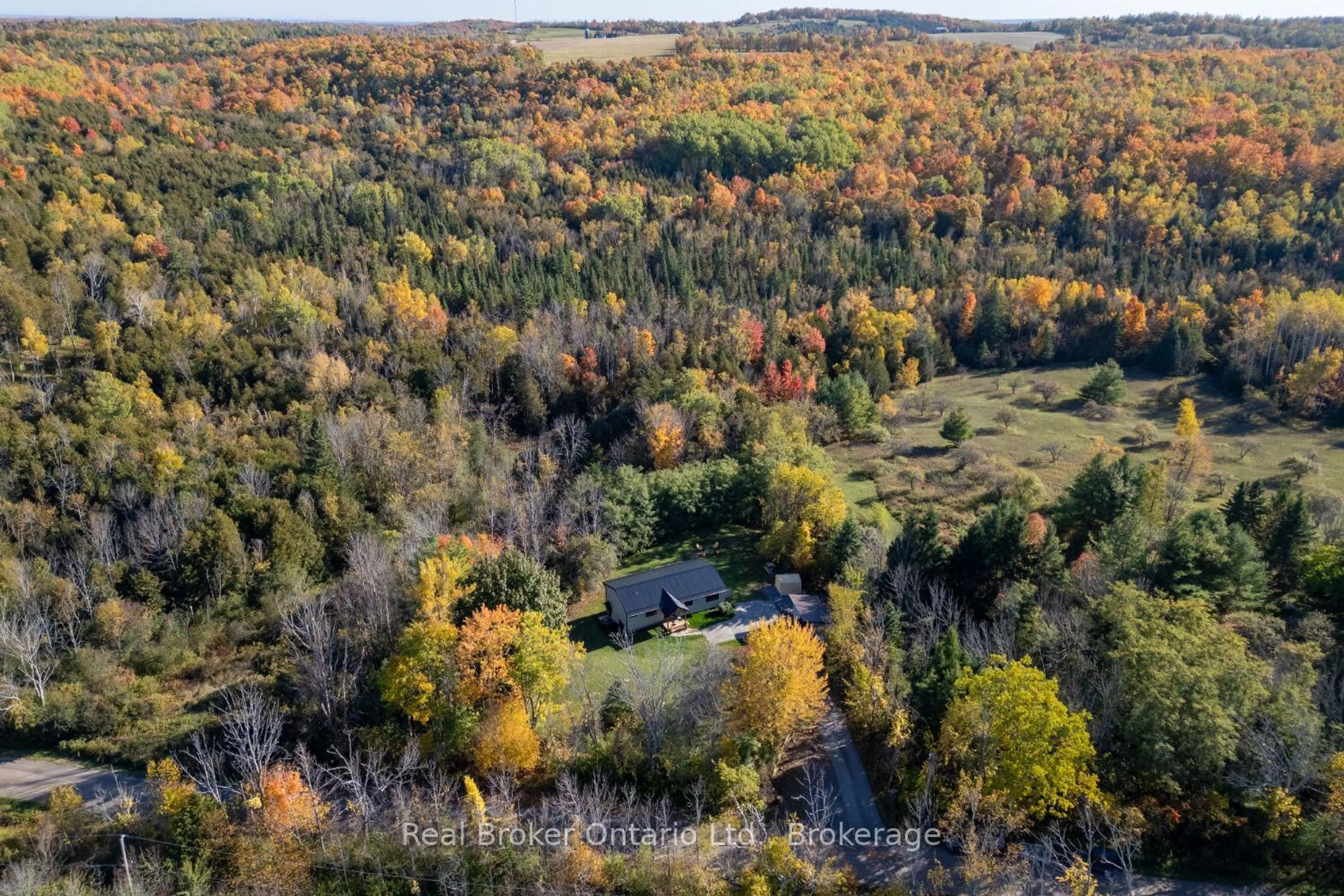 A pic from outside/outdoor area/front of a property/back of a property/a pic from drone, forest/trees view for 250 Silver Heights Dr, Trent Hills Ontario K0L 1Y0