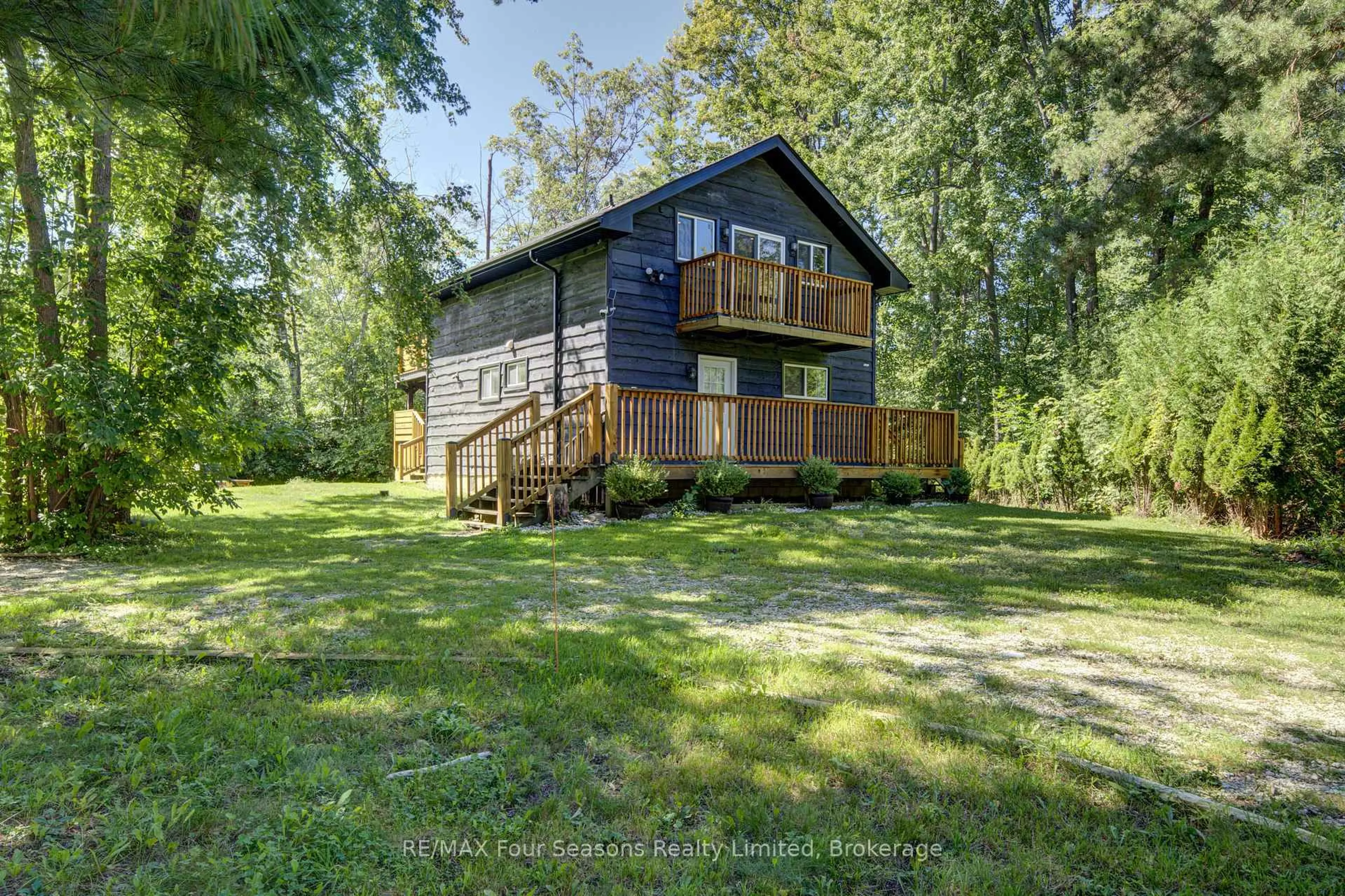 A pic from outside/outdoor area/front of a property/back of a property/a pic from drone, water/lake/river/ocean view for 126 Martin Grve, Blue Mountains Ontario L9Y 0N5