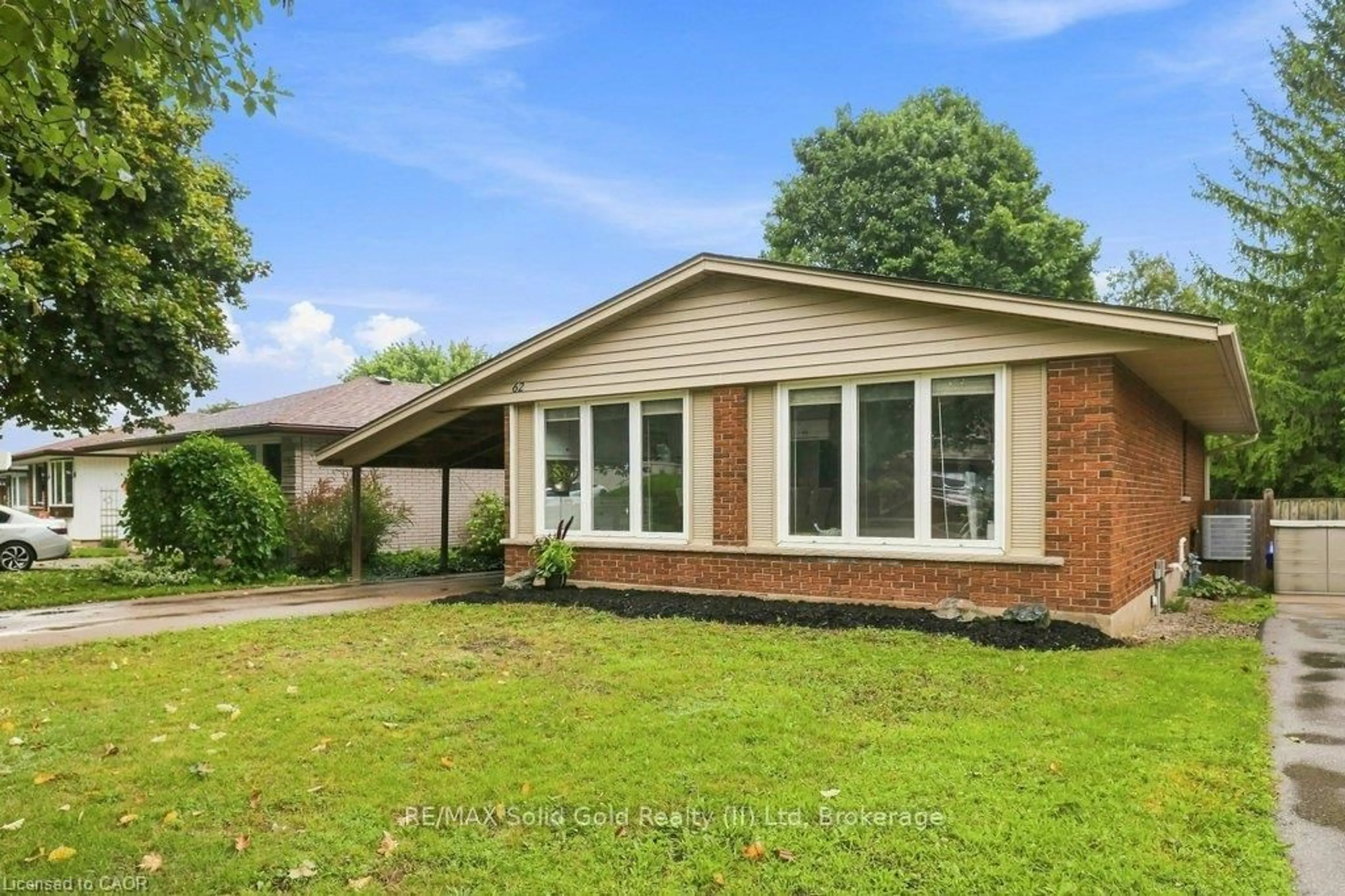 Home with brick exterior material, street for 62 Pinedale Dr, Kitchener Ontario N2E 1J7