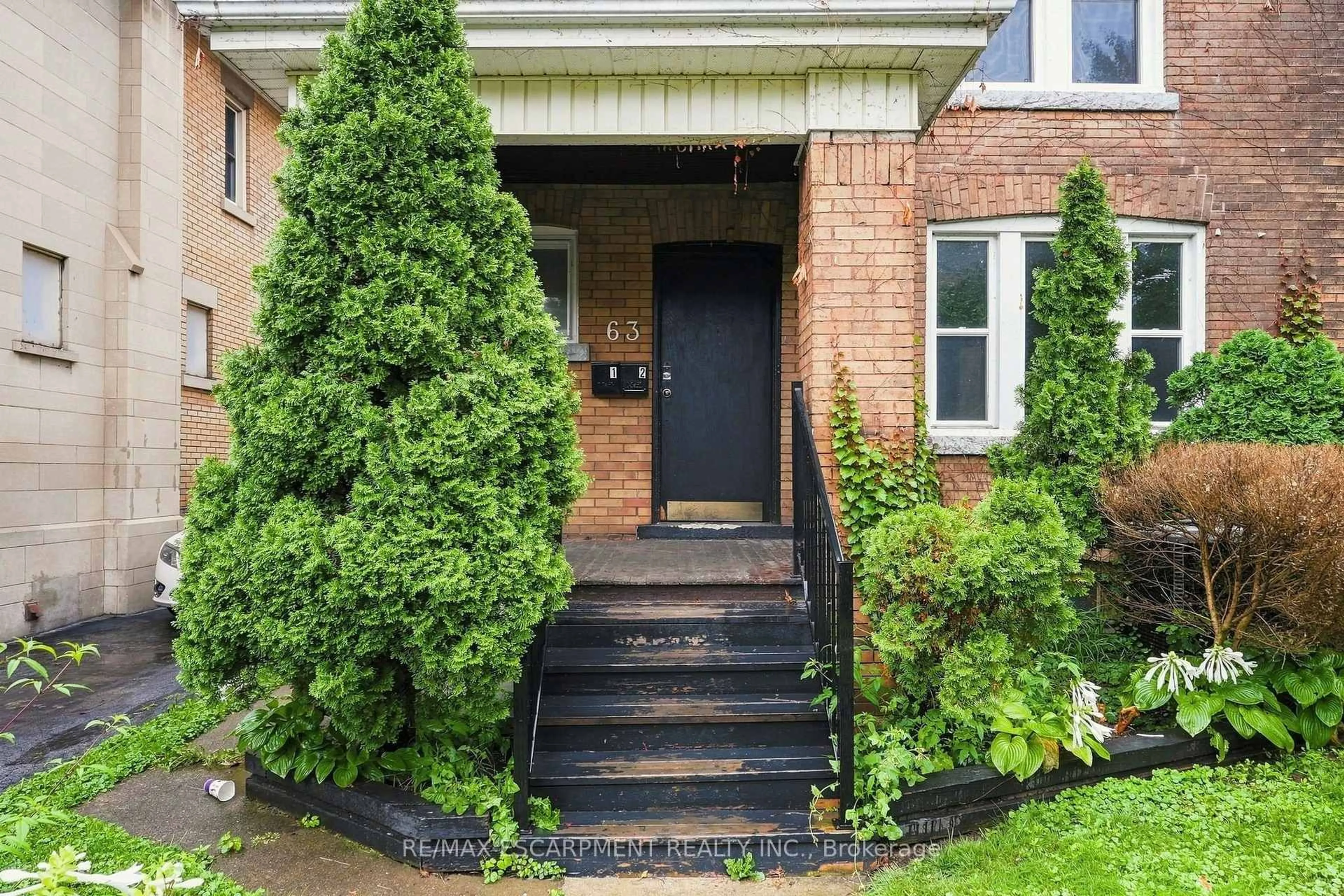 Home with brick exterior material, street for 63 Melrose Ave, Hamilton Ontario L8M 2Y4