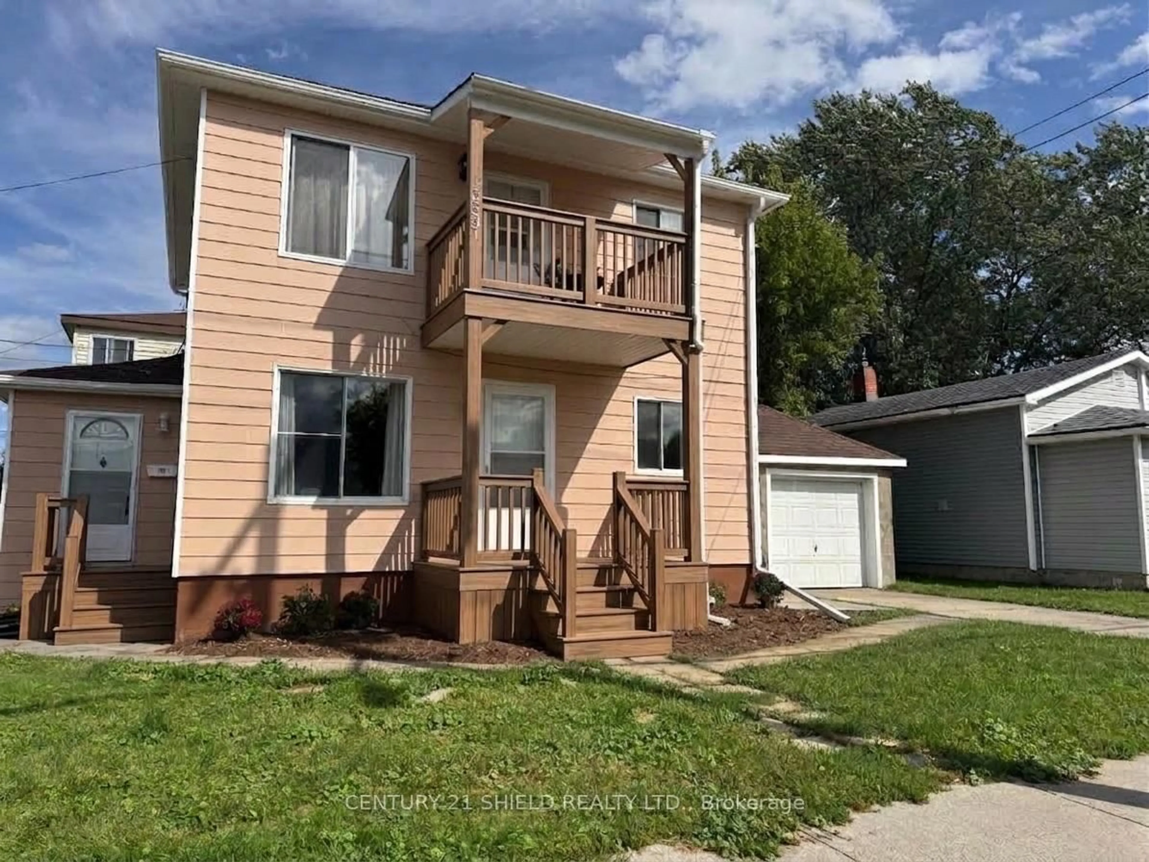 Home with vinyl exterior material, street for 733-733A CUMBERLAND St, Cornwall Ontario K6J 4J8