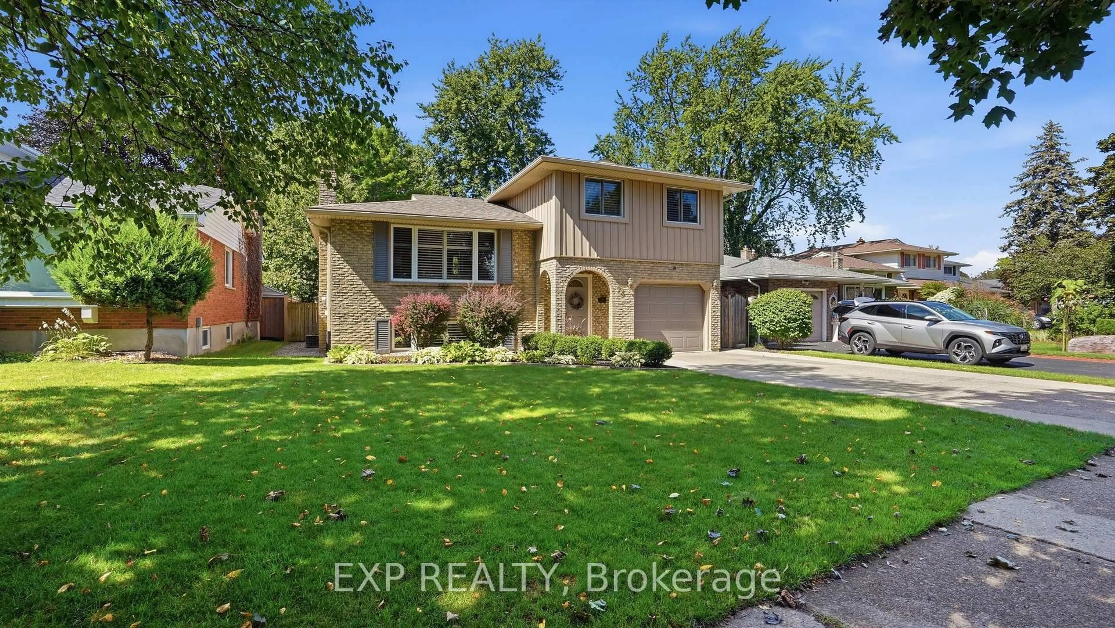 Home with brick exterior material, street for 73 Westgate Park Dr, St. Catharines Ontario L2N 6K1
