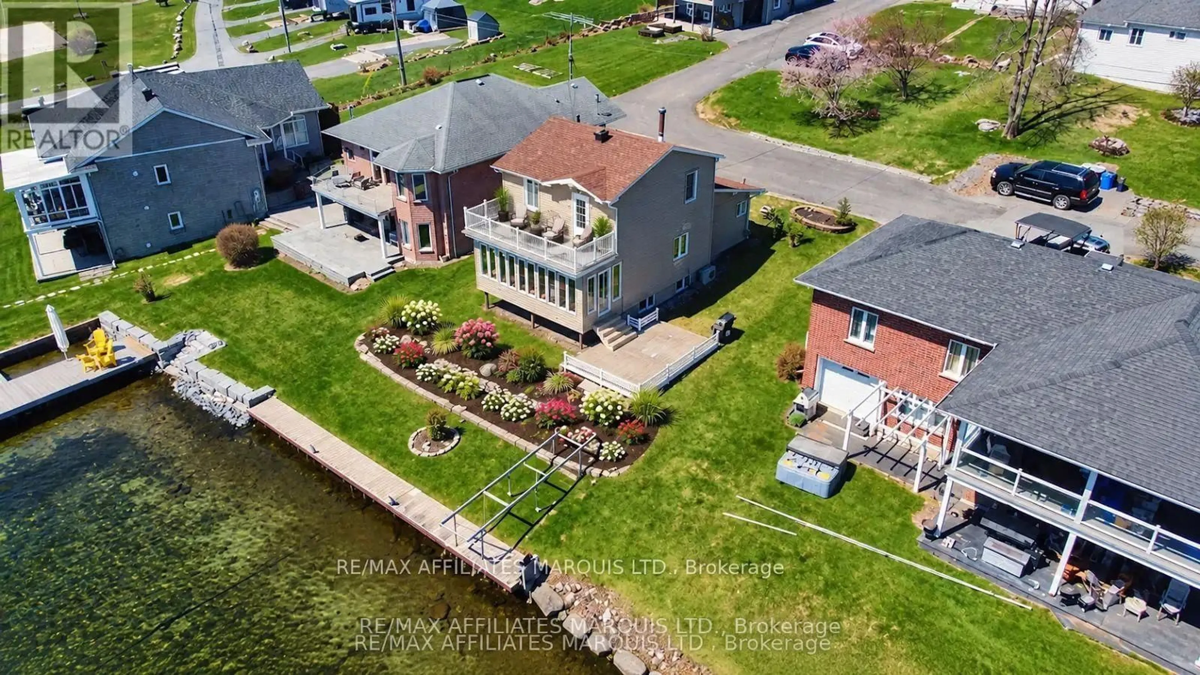A pic from outside/outdoor area/front of a property/back of a property/a pic from drone, water/lake/river/ocean view for 19564 County Rd 2 Rd, South Glengarry Ontario K0C 1E0