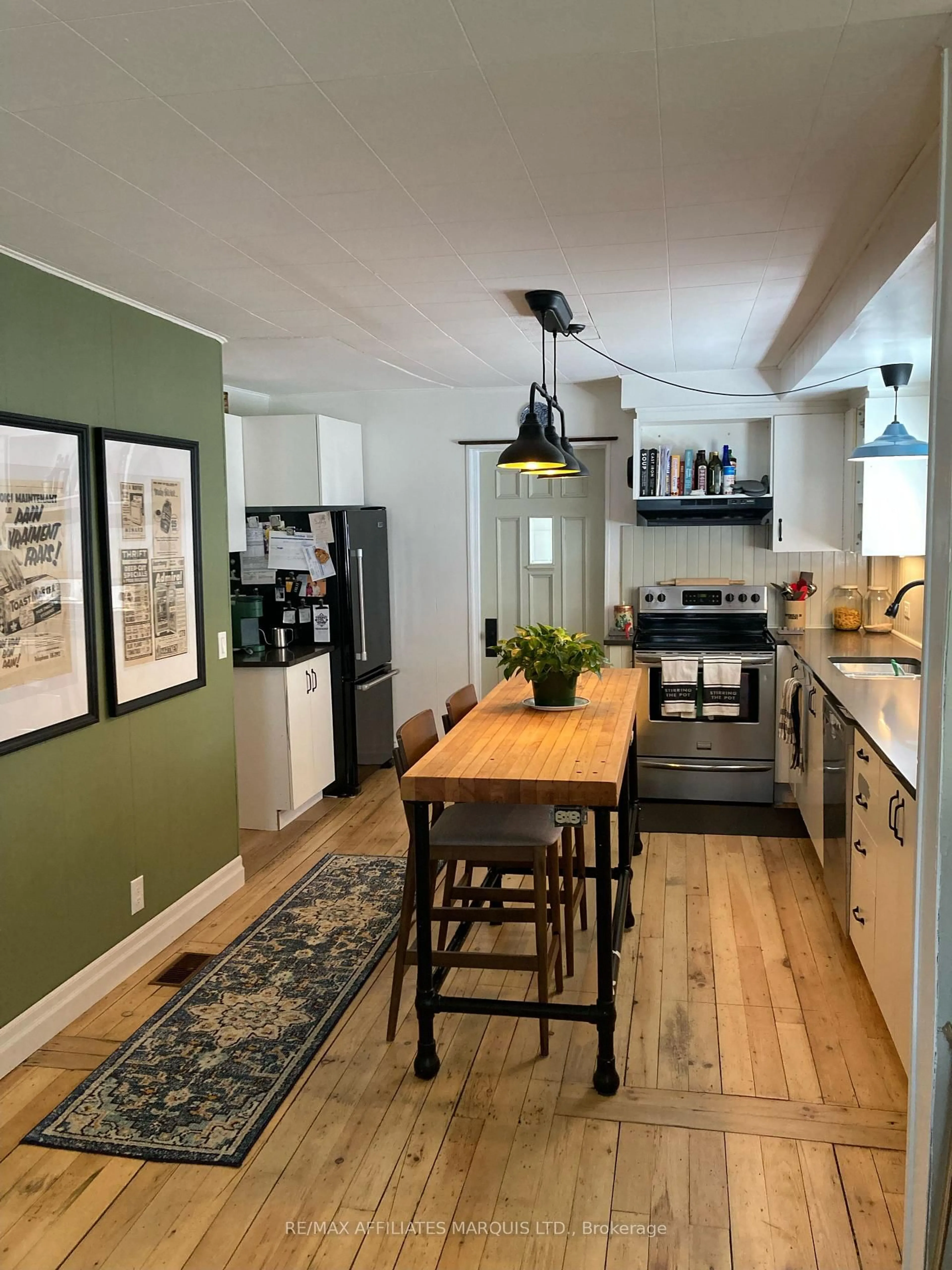 Open concept kitchen, wood/laminate floor for 302 Easton Ave, Cornwall Ontario K6H 1W9