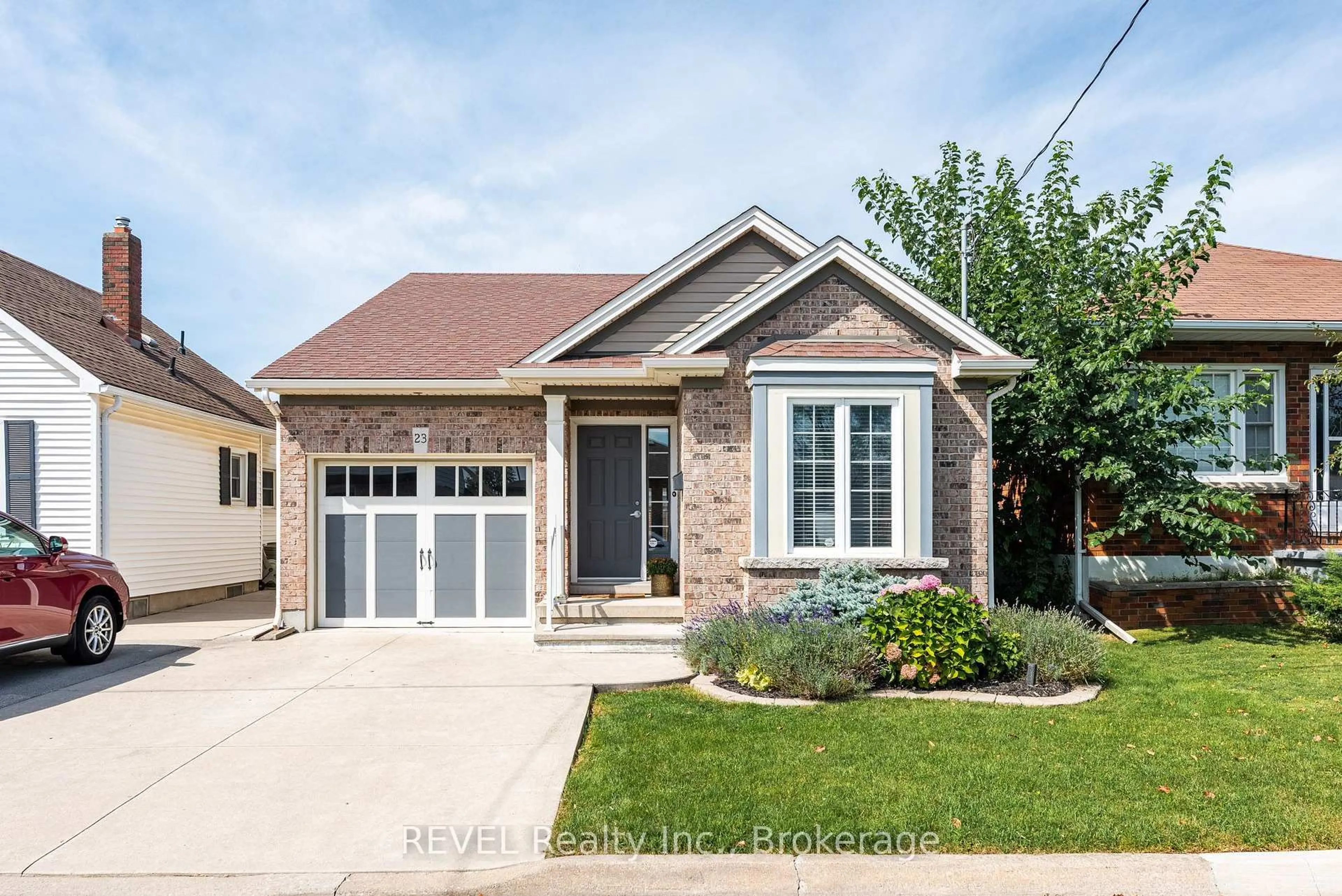 Home with brick exterior material, street for 23 Myrtle Ave, St. Catharines Ontario L2M 5W2