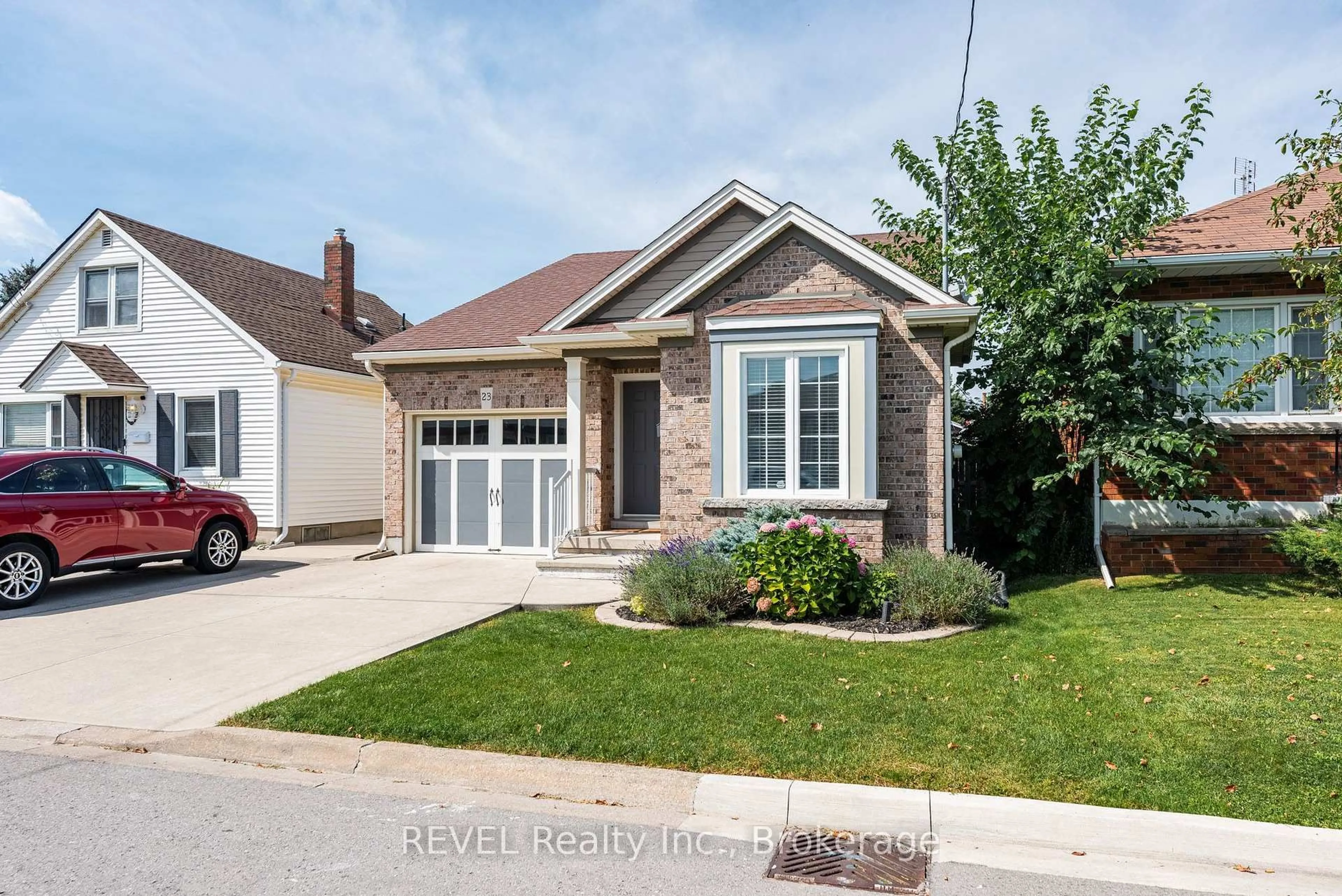 Home with brick exterior material, street for 23 Myrtle Ave, St. Catharines Ontario L2M 5W2