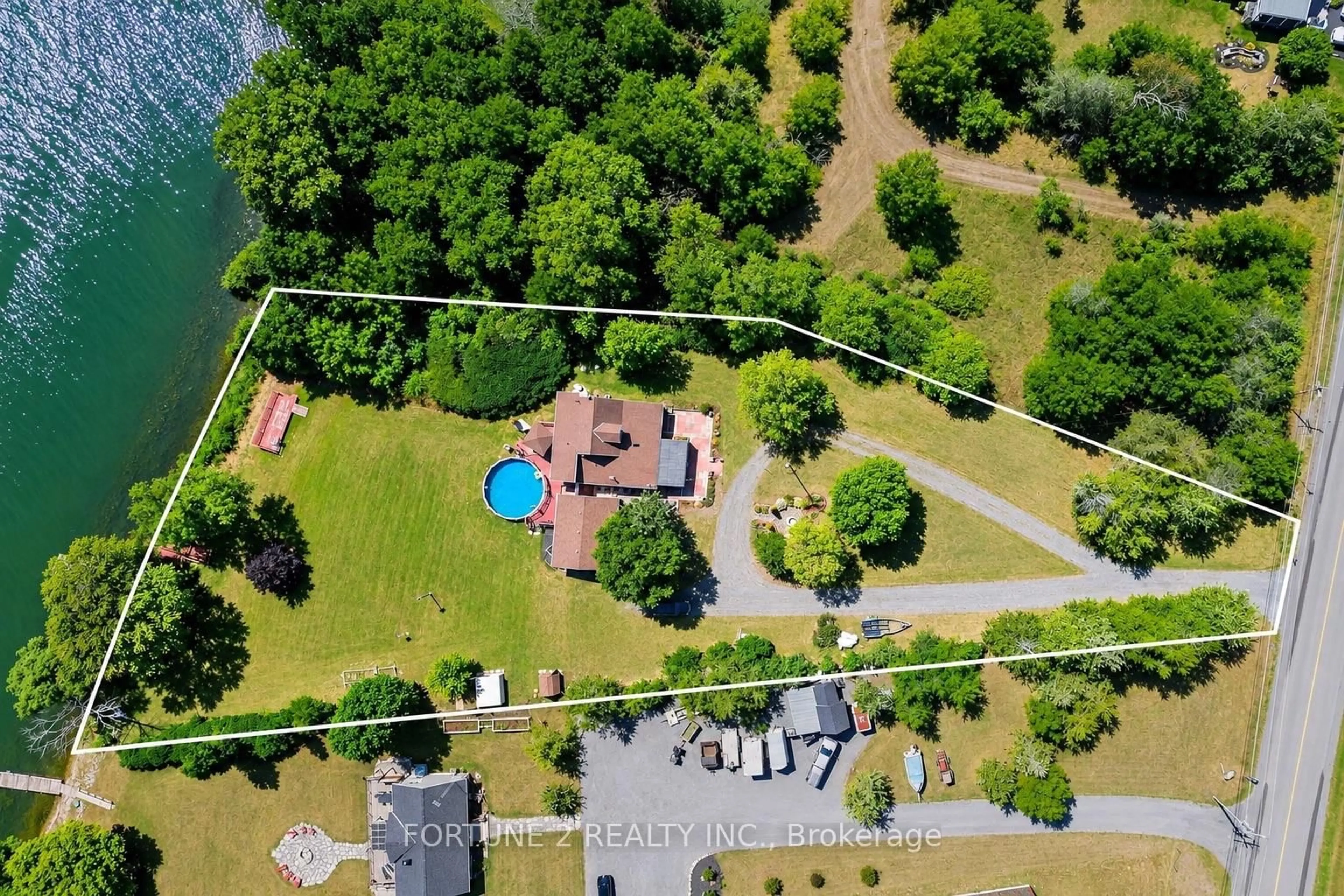 A pic from outside/outdoor area/front of a property/back of a property/a pic from drone, water/lake/river/ocean view for 5397 County 9 Rd, Napanee Ontario K7R 3K8