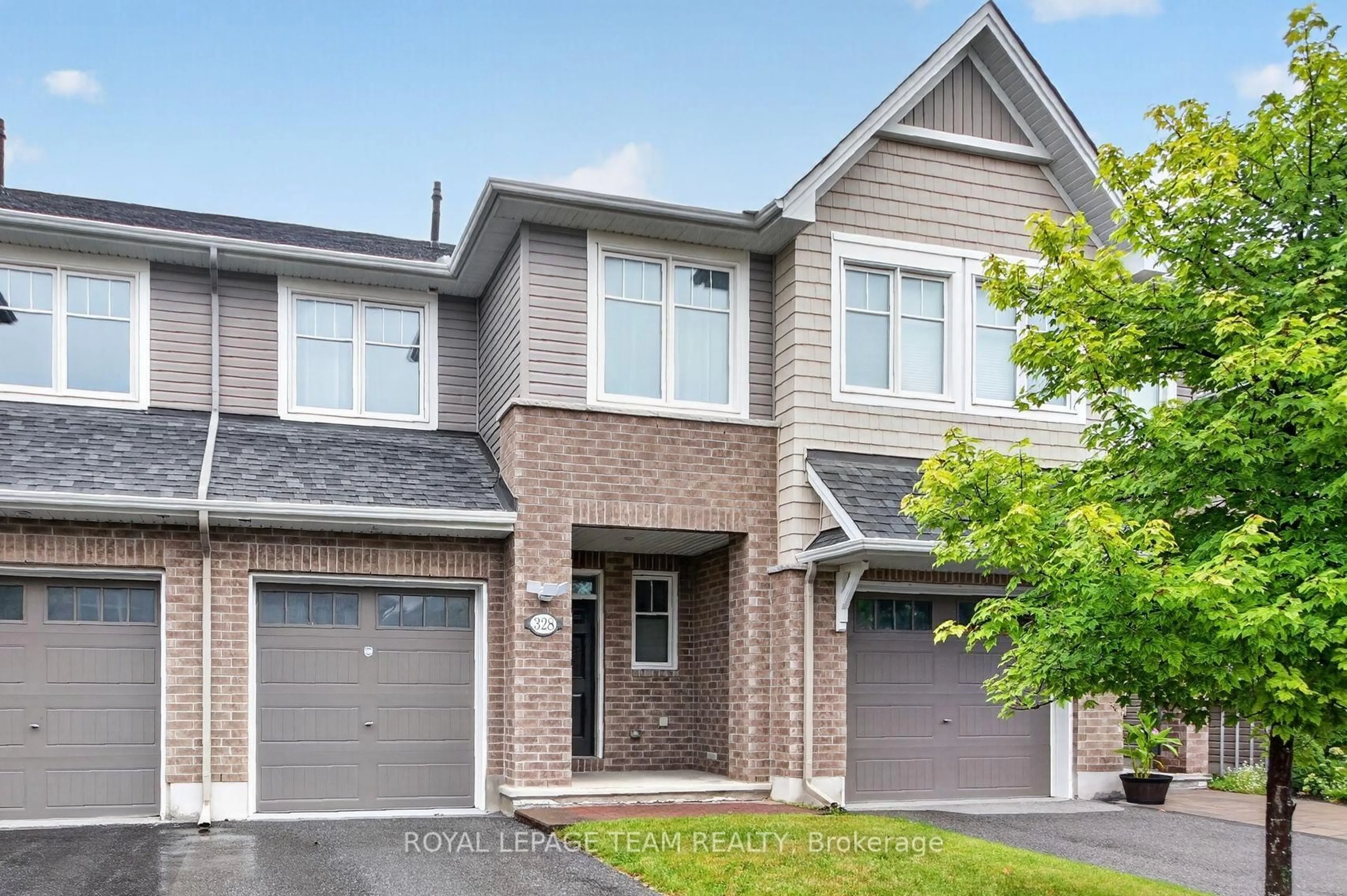 Home with brick exterior material, street for 328 WARMSTONE Dr, Ottawa Ontario K2S 0W3