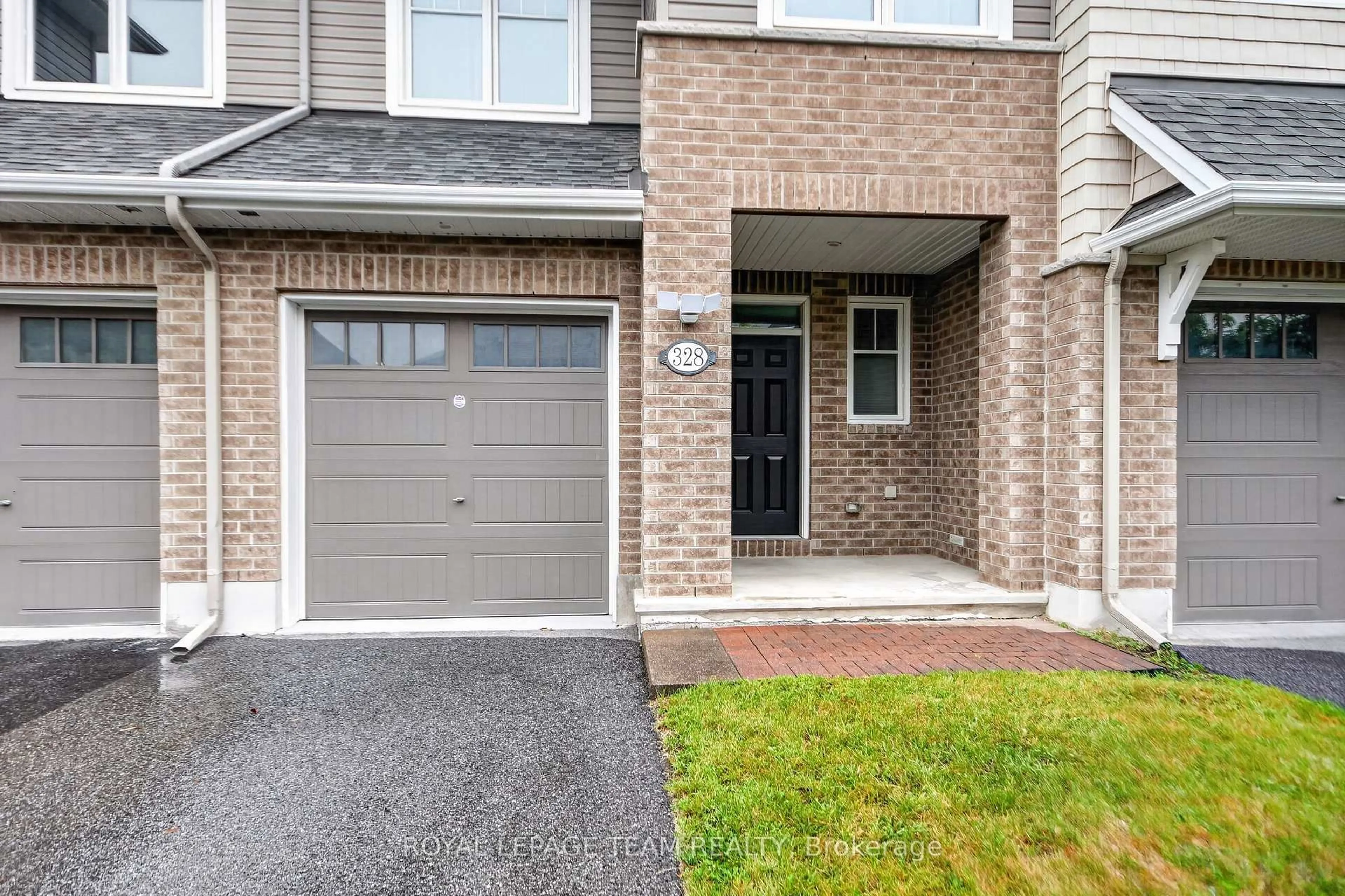 Home with brick exterior material, street for 328 WARMSTONE Dr, Ottawa Ontario K2S 0W3