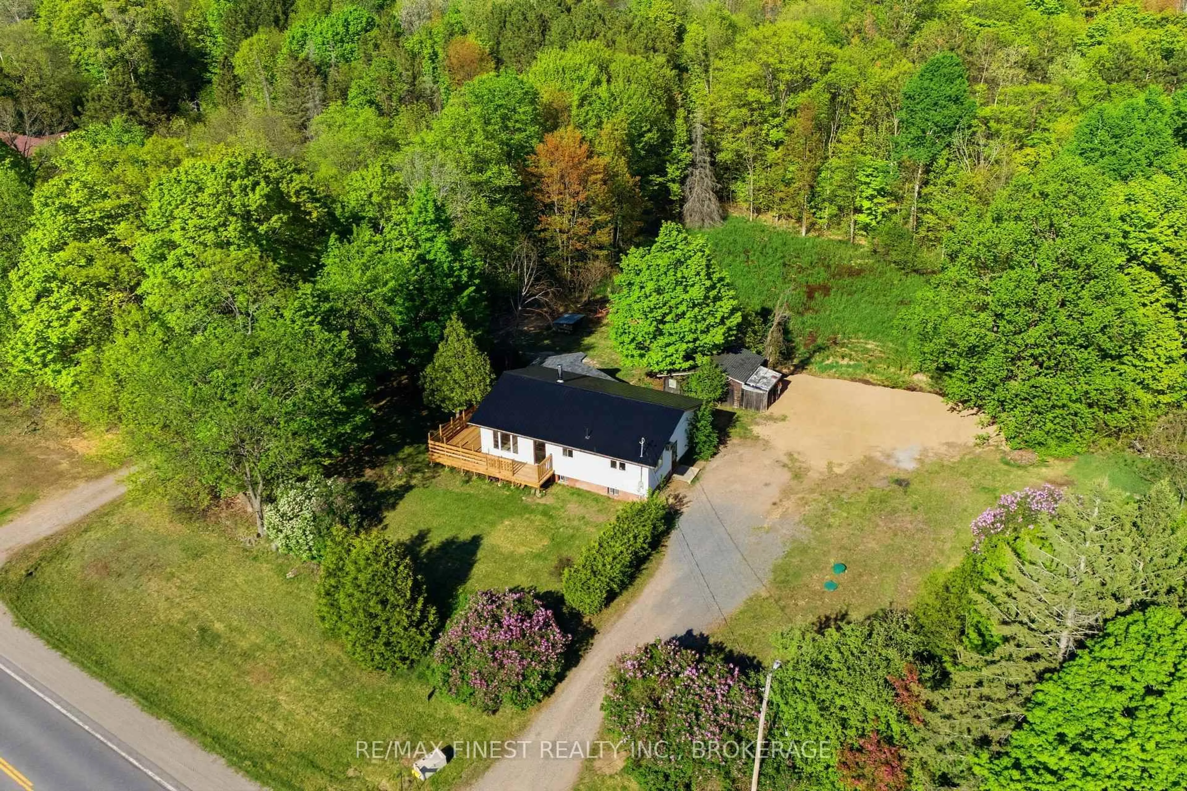 A pic from outside/outdoor area/front of a property/back of a property/a pic from drone, forest/trees view for 12452 Road 38 Rd, Tichborne Ontario K0H 2V0