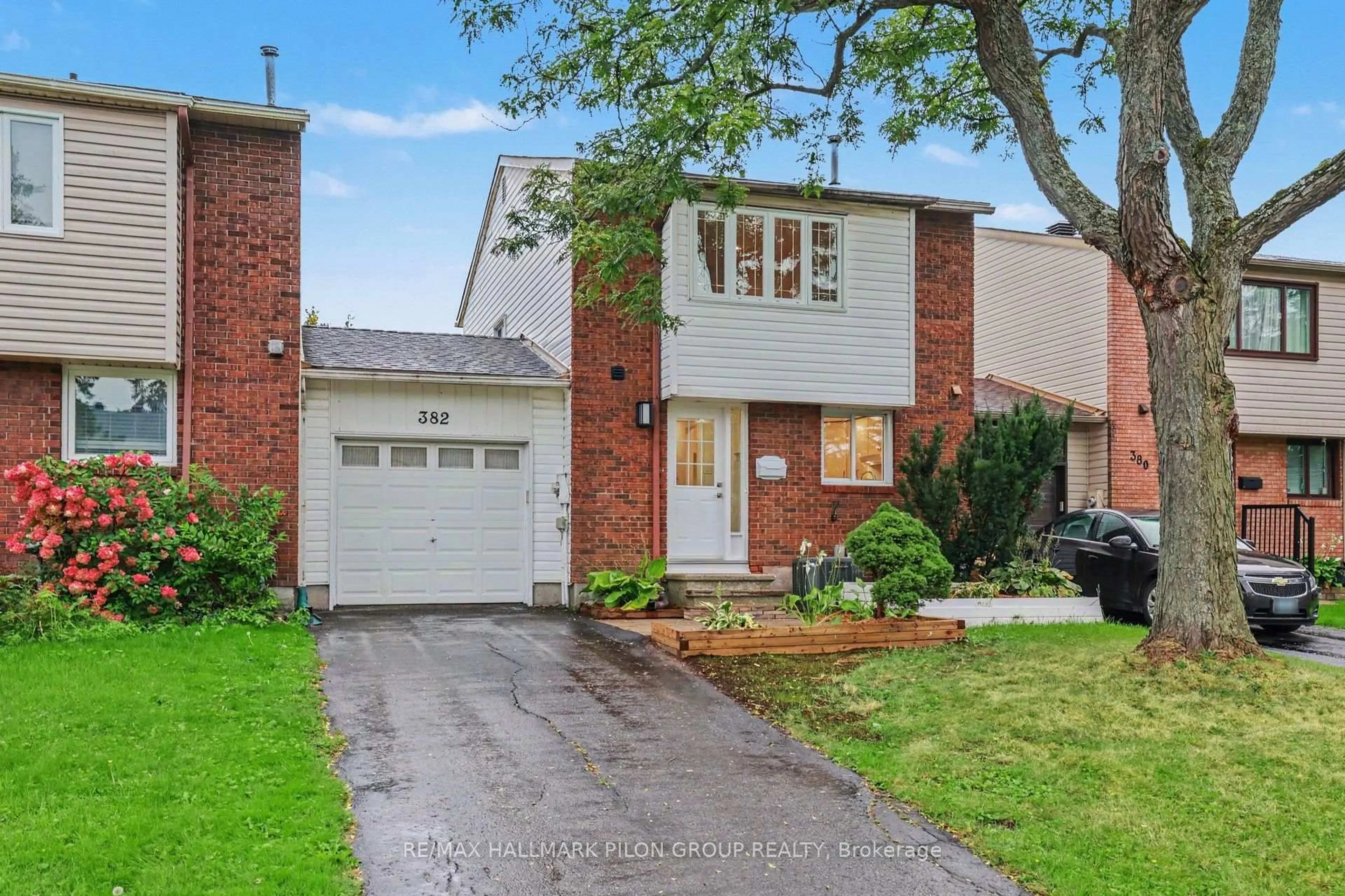 Home with brick exterior material, street for 382 Duval Lane, Orleans Ontario K1E 2K2