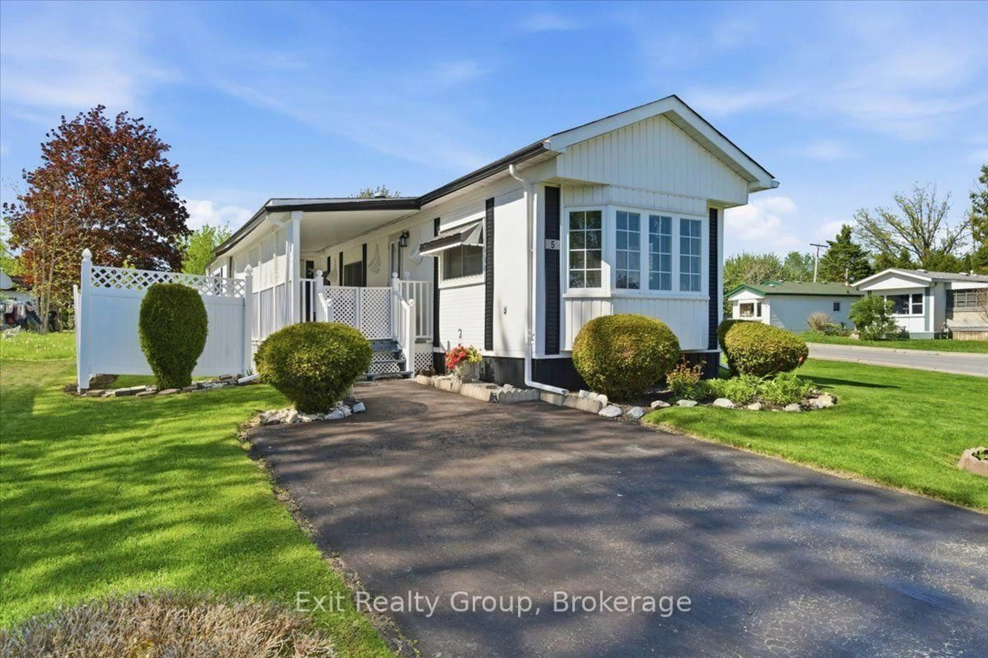 Home with vinyl exterior material, street for 5 Chapel Blvd, Quinte West Ontario K8N 4Z3