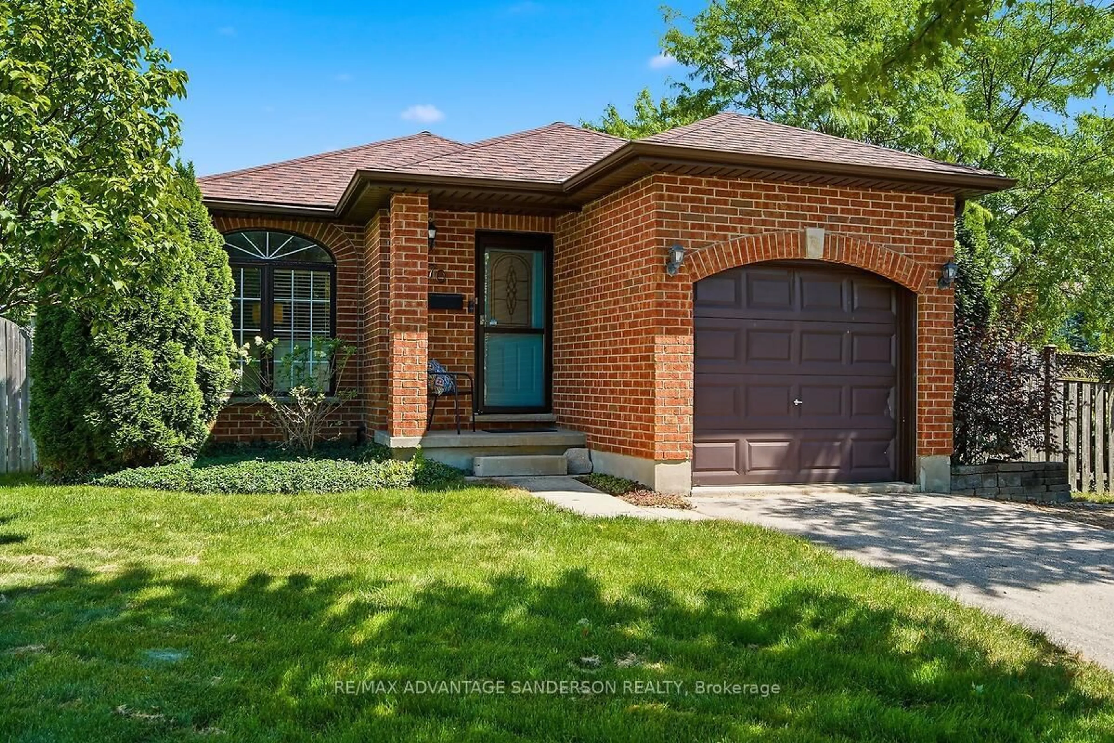 Home with brick exterior material, street for 70 Maxine Crt, Middlesex Centre Ontario N0L 1R0