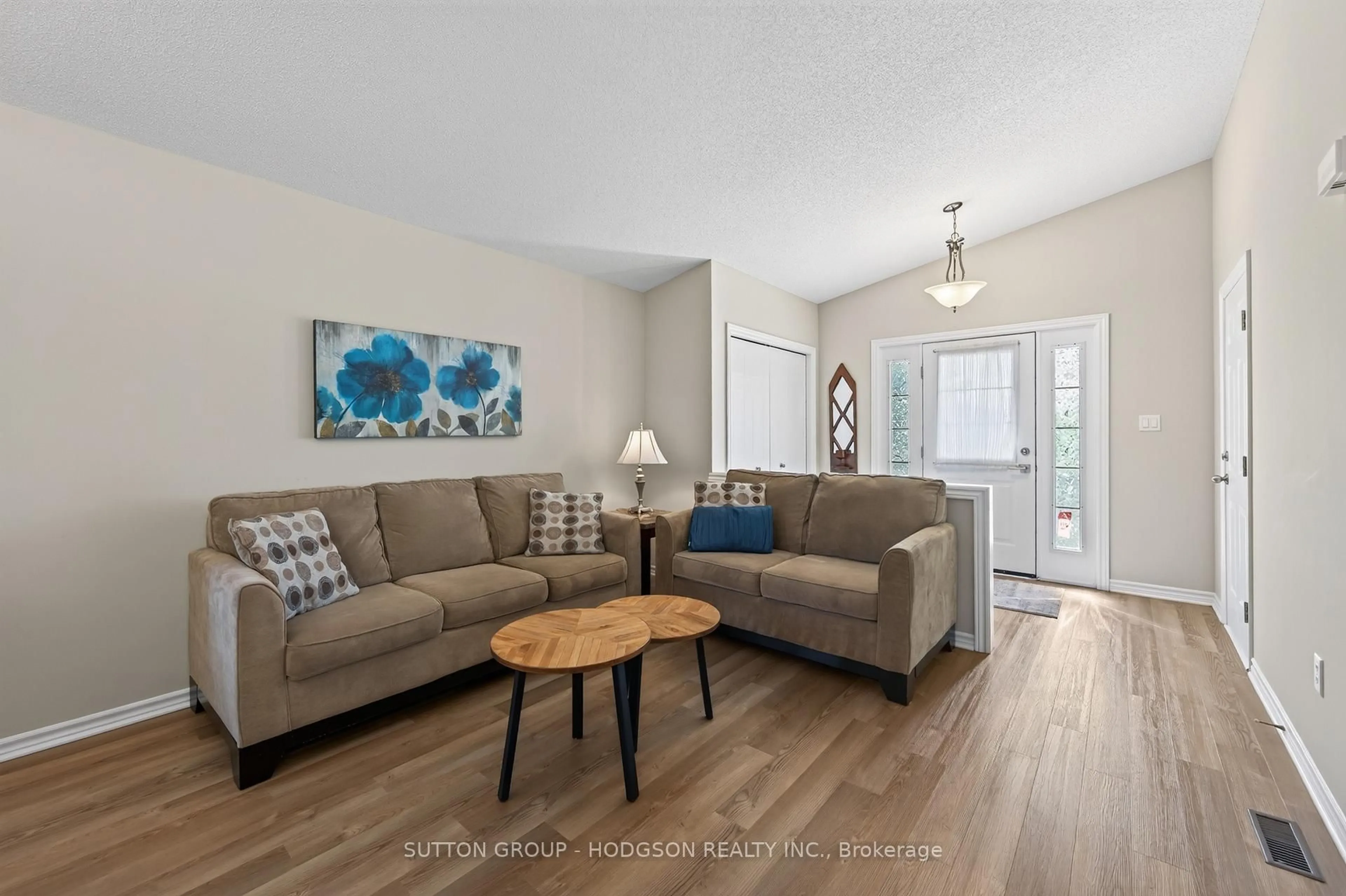 Living room with furniture, wood/laminate floor for 912 Blythwood Rd, London North Ontario N6H 5V1