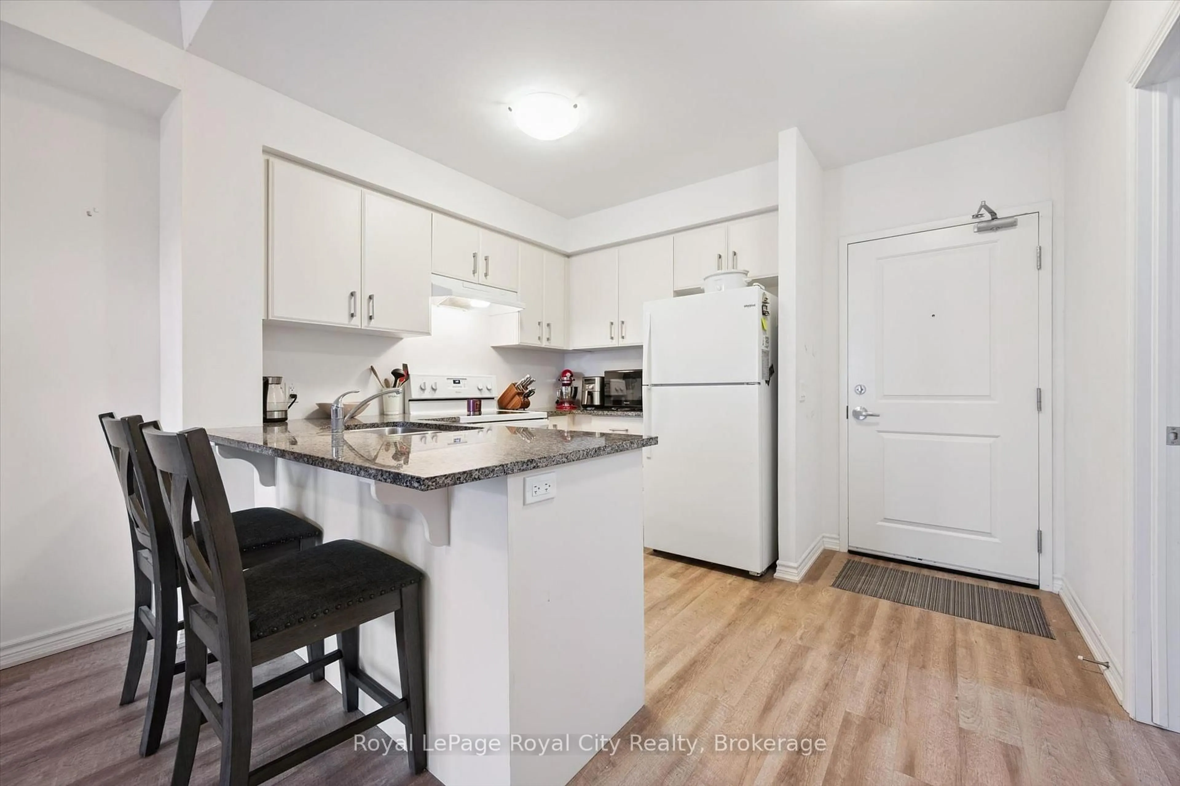 Standard kitchen, wood/laminate floor for 1284 Gordon St #229, Guelph Ontario N1L 0M8