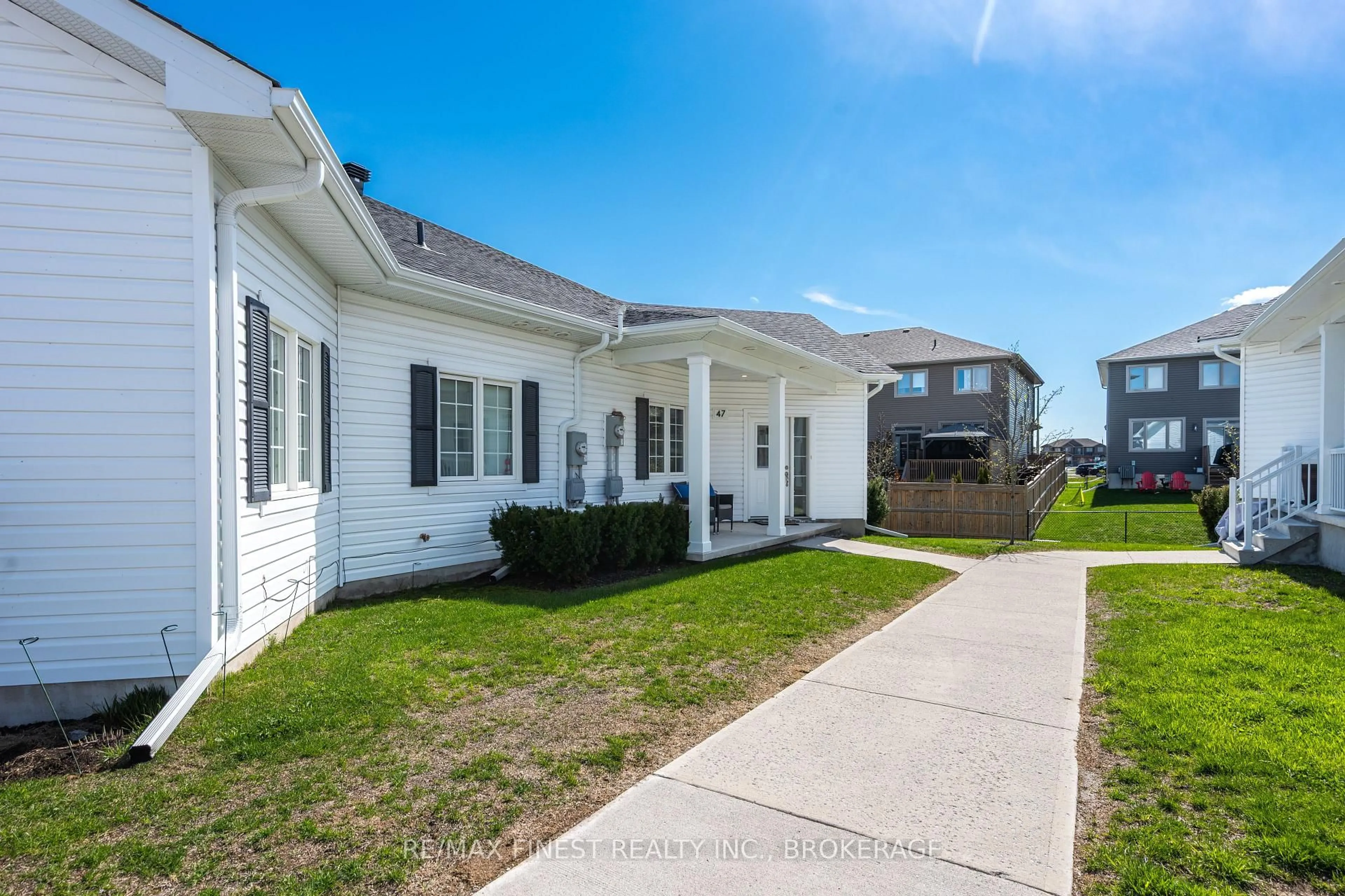 Home with vinyl exterior material, street for 47 Lowry Pl, Loyalist Ontario K7N 0E2