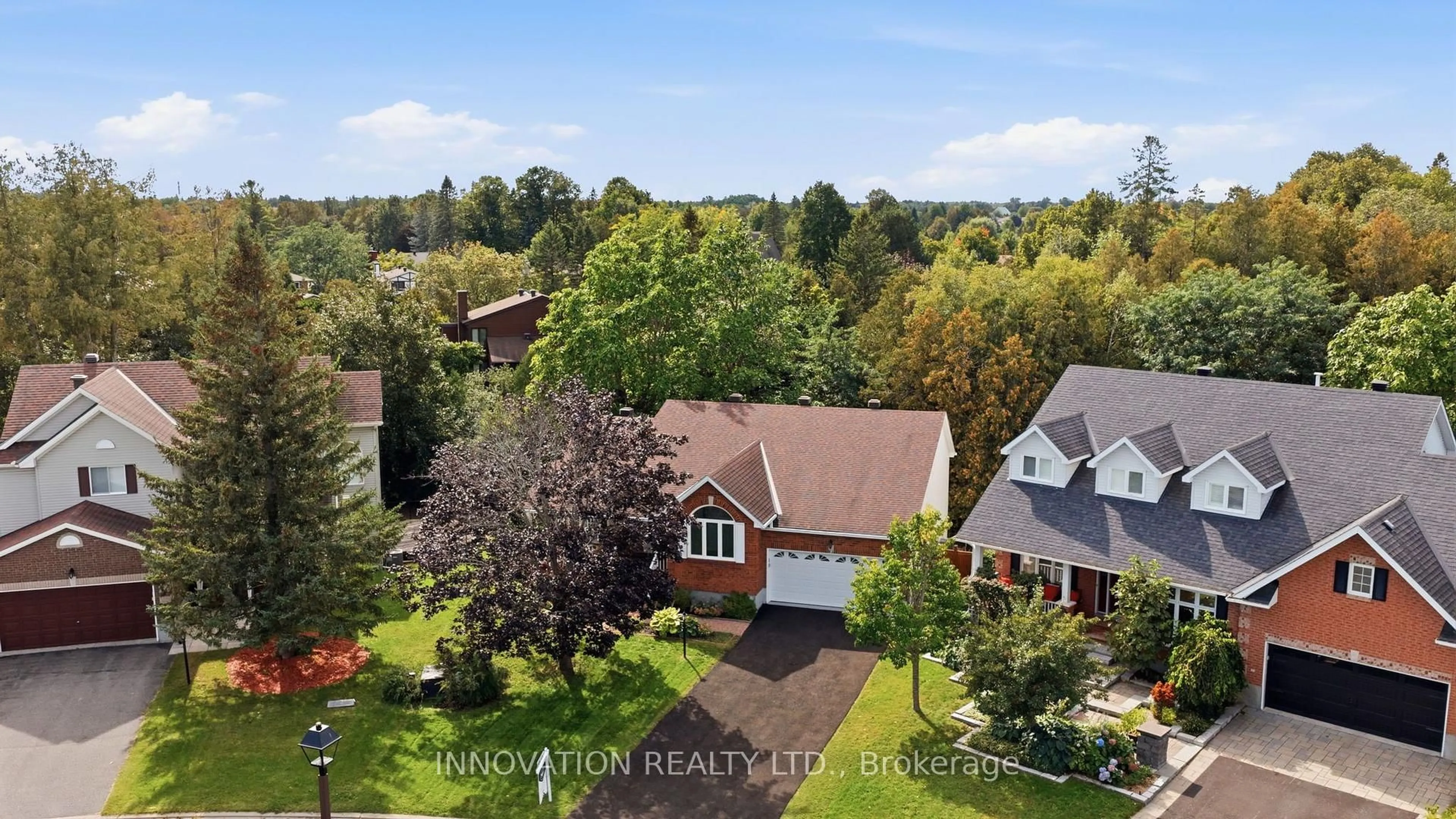 A pic from outside/outdoor area/front of a property/back of a property/a pic from drone, unknown for 83 Forest Creek Dr, Ottawa Ontario K2S 1M2